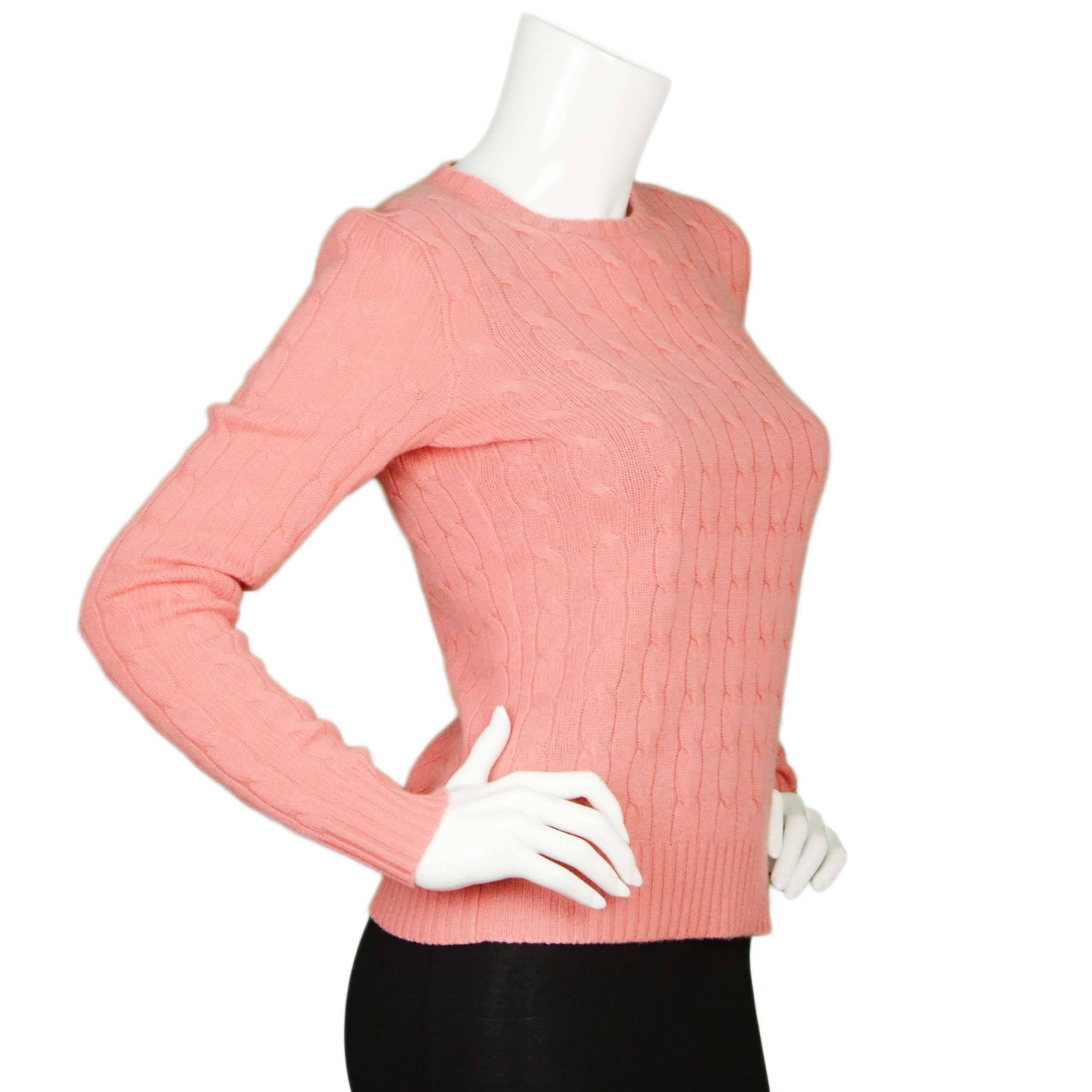 Ralph Lauren Salmon Cable Knit Cashmere Sweater 
Features crew neckline
Made In: China
Color: Salmon
Composition: 100% Cashmere
Lining: None
Closure/Opening: Pull over
Exterior Pockets: None
Interior Pockets: None
Overall Condition: