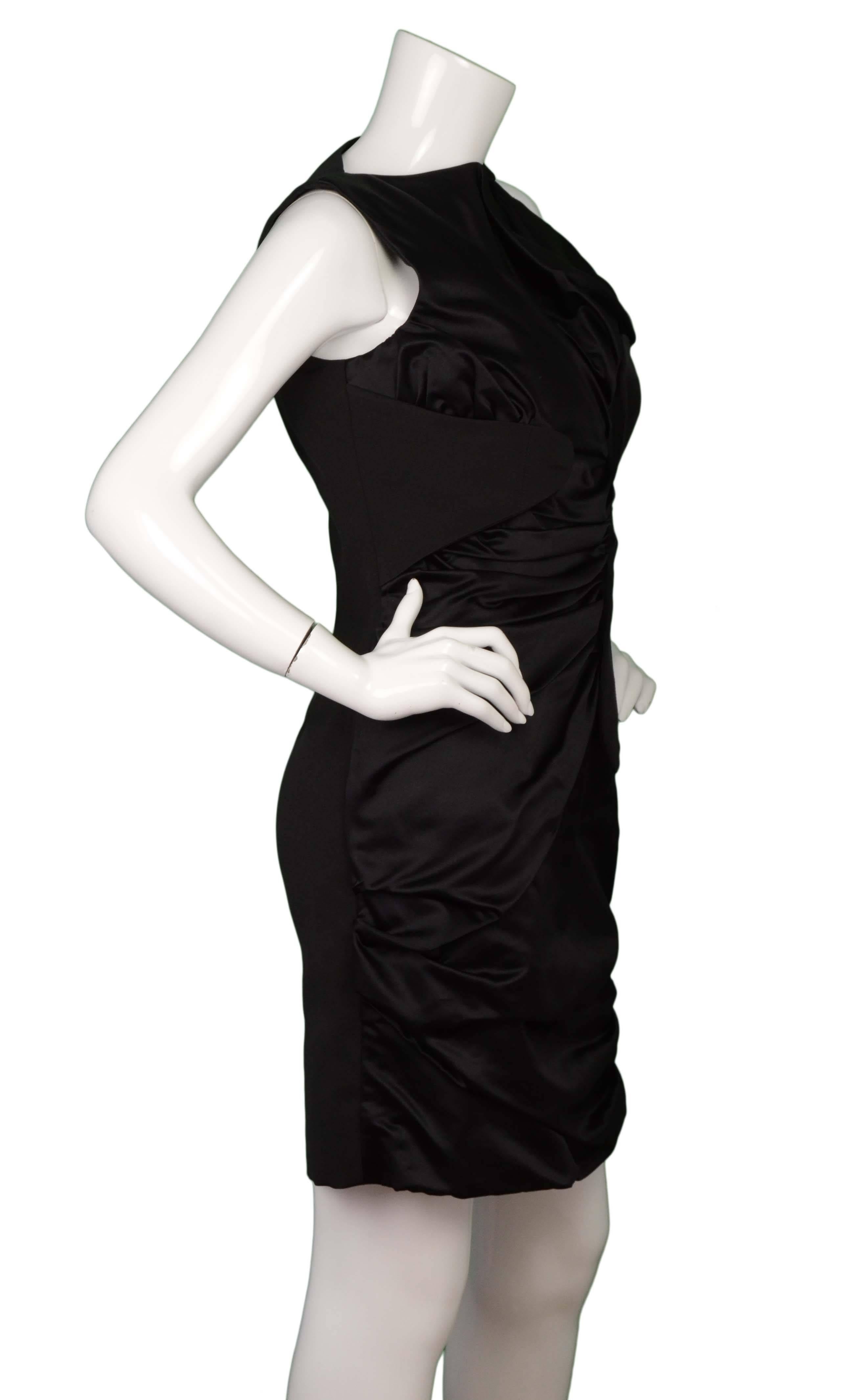 Marios Schwab Black Satin Sleeveless Cocktail Dress 
features ruching throughout
Made In: UK
Color: Black
Composition: Not given- beleived to be satin on front panel and grosgrain on back panel
Lining: Beige satin
Closure/Opening: Back center