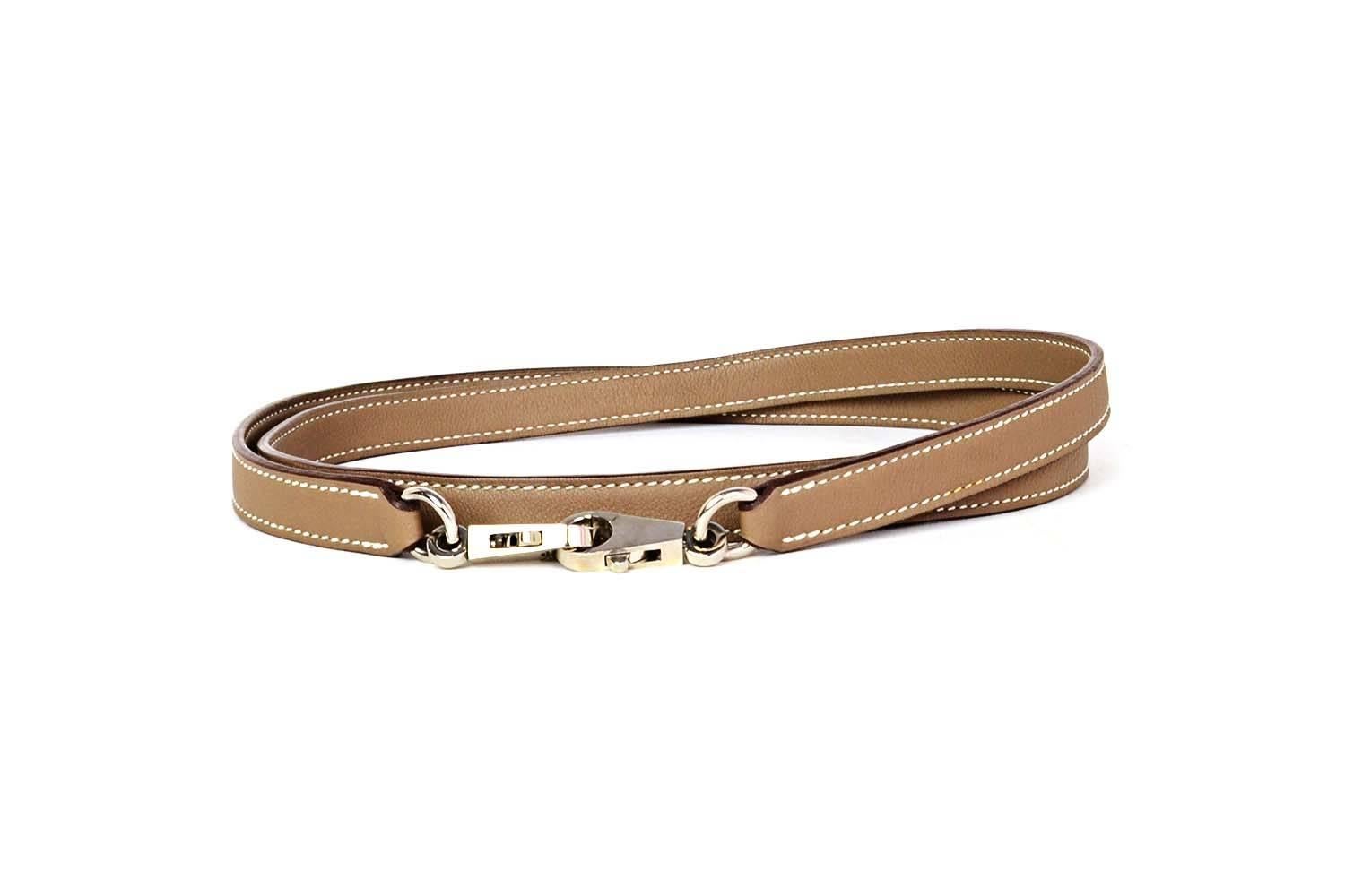 Hermes Swift Etoupe Kelly/Bolide Bag Strap 
Note: This bag strap was custom made and therefore does not have an Hermes date stamp
Made In: France
Color: Etoupe
Hardware: Palladium
Materials: Leather and metal
Closure/Opening: Double sided