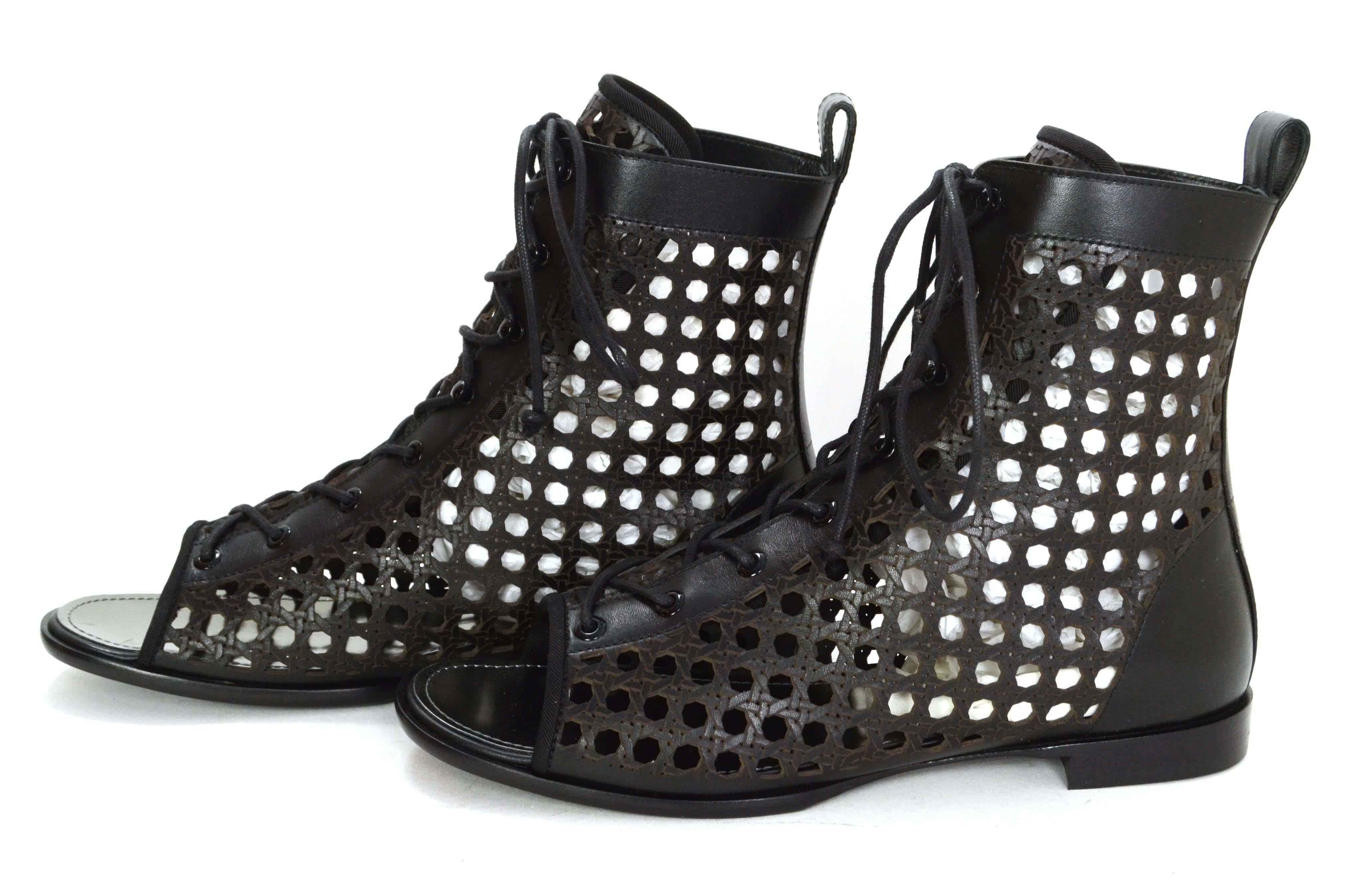 Proenza Schouler Black Perforated Open Toe Booties 
Features metallic silver leather insole
Made In: Italy
Color: Black
Materials: Leather
Closure/Opening: Lace up
Sole Stamp: Vero cuoio Made In Italy 39 1/2
Overall Condition: