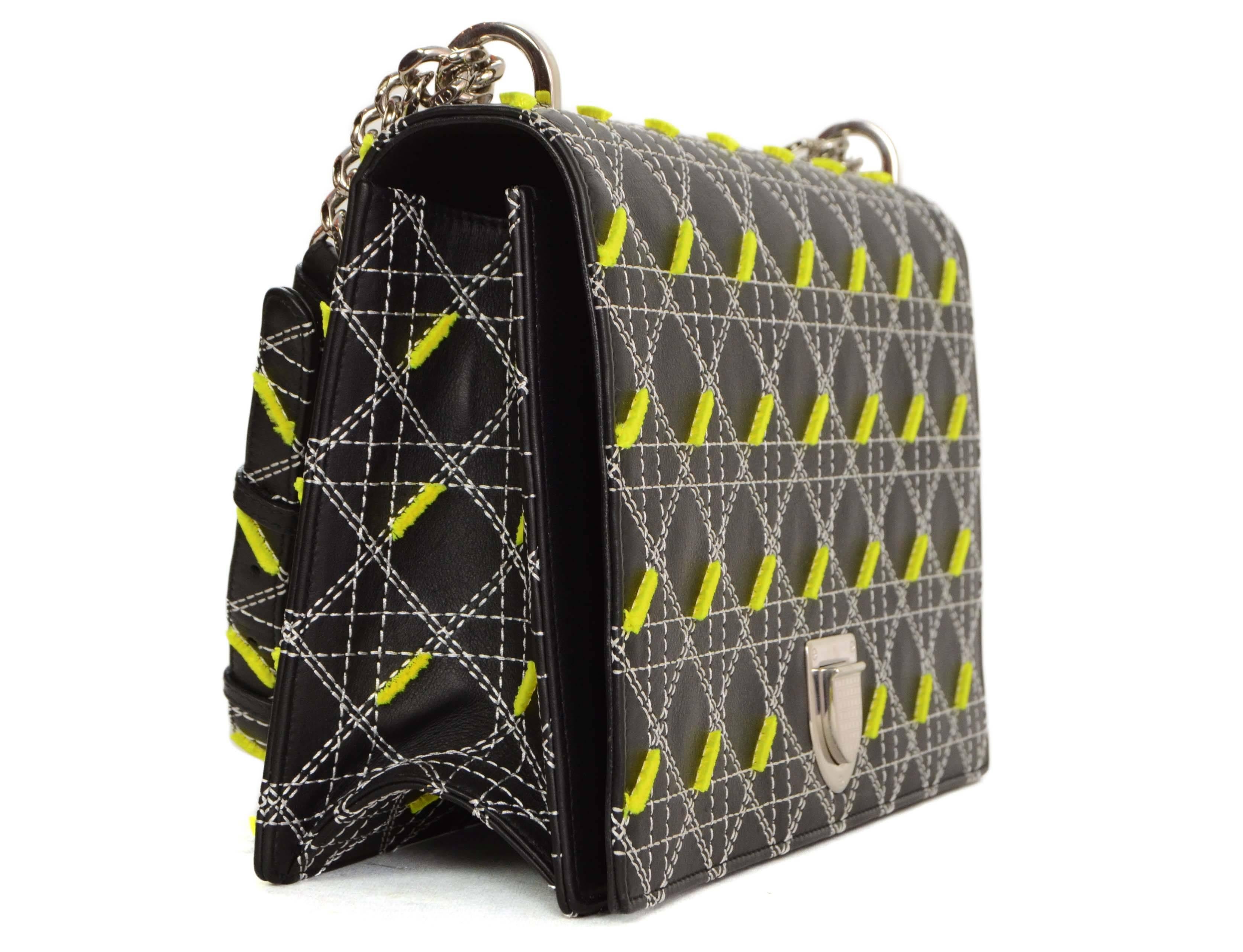 Christian Dior Black Quilted Diorama Large Flap Bag 
Features neon accents and white contrast stitching throughout
Made In: Italy
Color: Black, white and neon green
Hardware: Silvertone
Materials: Leather, metal and polyester blend
Lining: