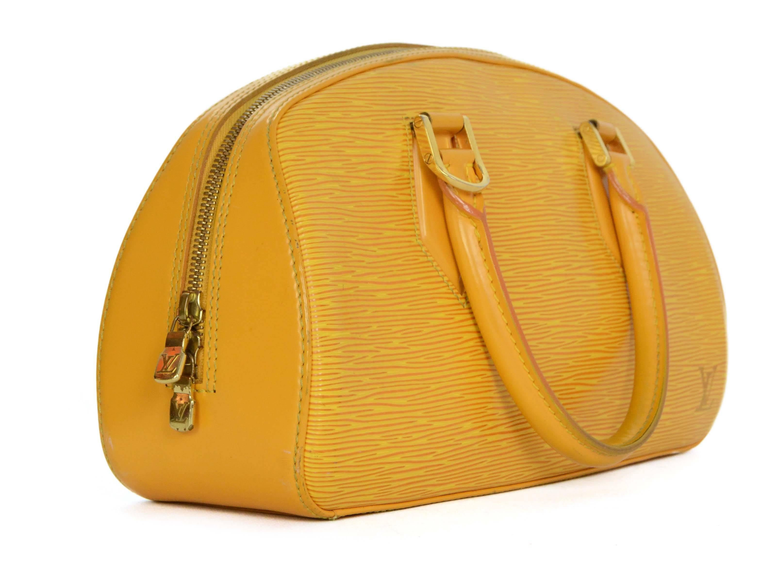 Louis Vuitton Yellow Epi Leather Jasmin Bag 
Features small LV on front corner of bag
Made In: France
Year of Production: 2003
Color: Yellow
Hardware: Goldtone
Materials: Epi leather
Lining: Purple microfiber
Closure/Opening: Double zip