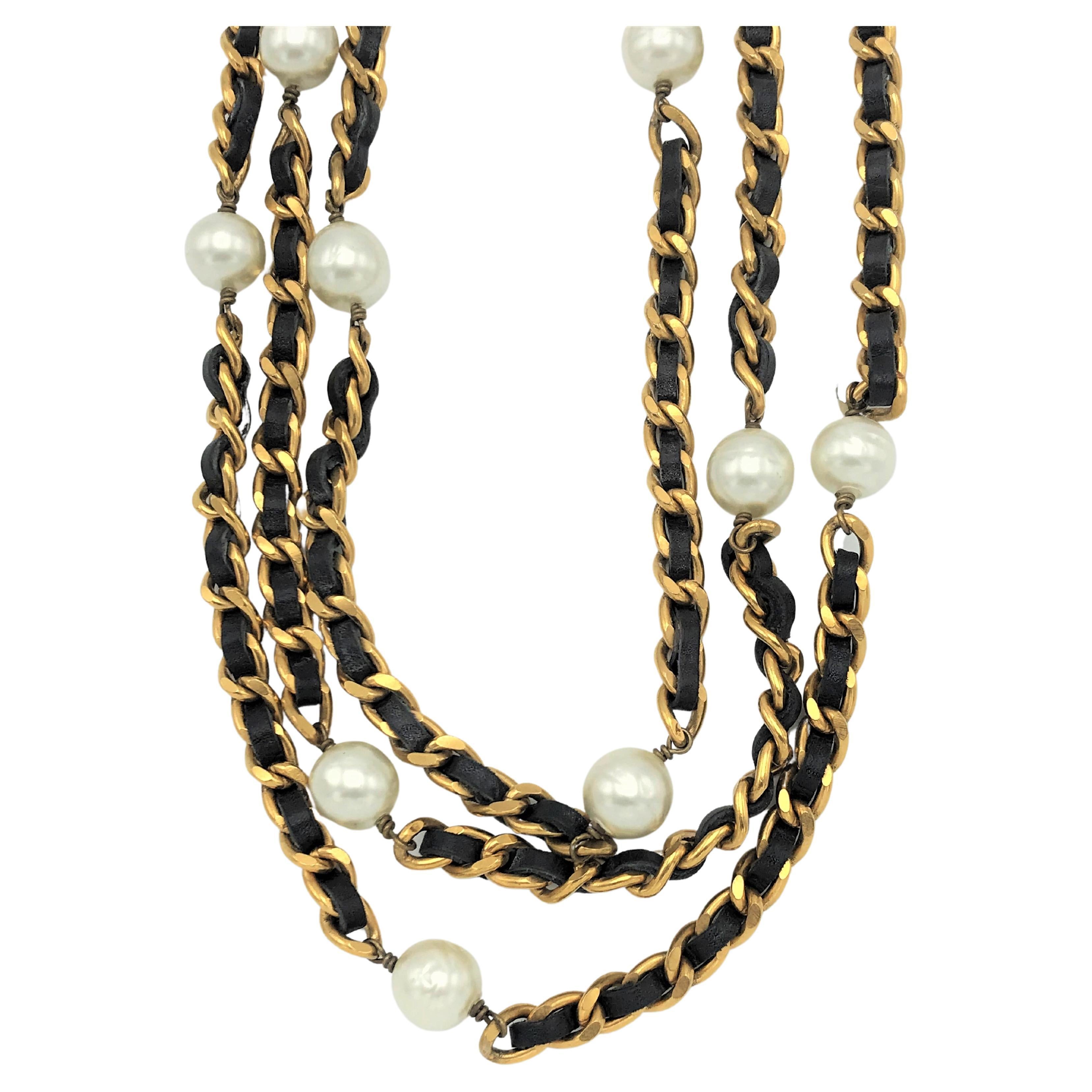 An Iconic Chain with leather woven throughout and Chanel pearls. There are 17 imitation Chanel pearls with a diameter of 1 cm. 
The necklace forms a perfect assemble to the earrings of Victoire de Castellane which I also offer. In addition, the