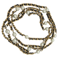 Vintage Iconic Chanel chain with leather woven throughout and Chanel pearls, 1990s