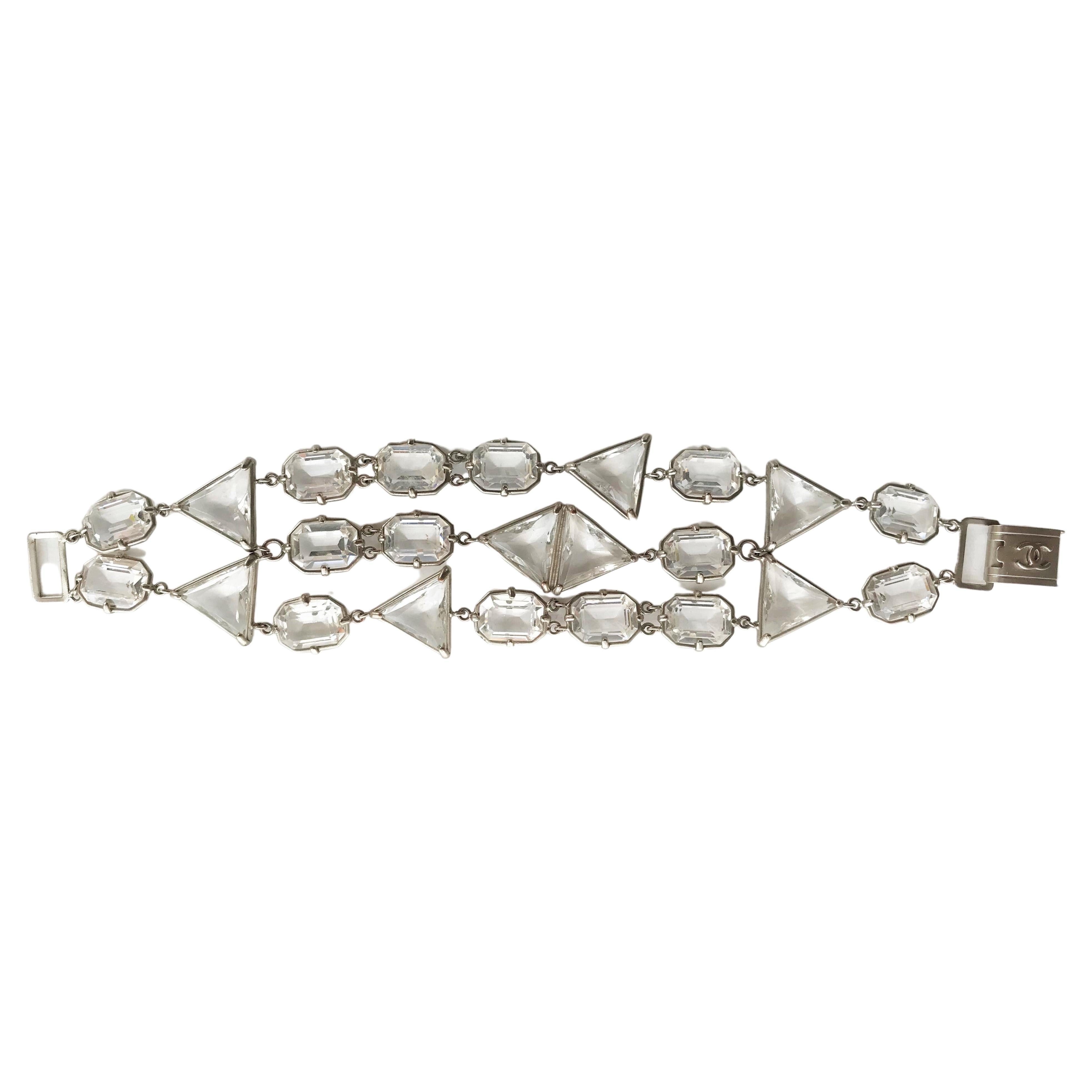 Art Deco CHANEL BRACELET, 3 rows of faceted crystals, logo closure, signed. 1998 P  For Sale