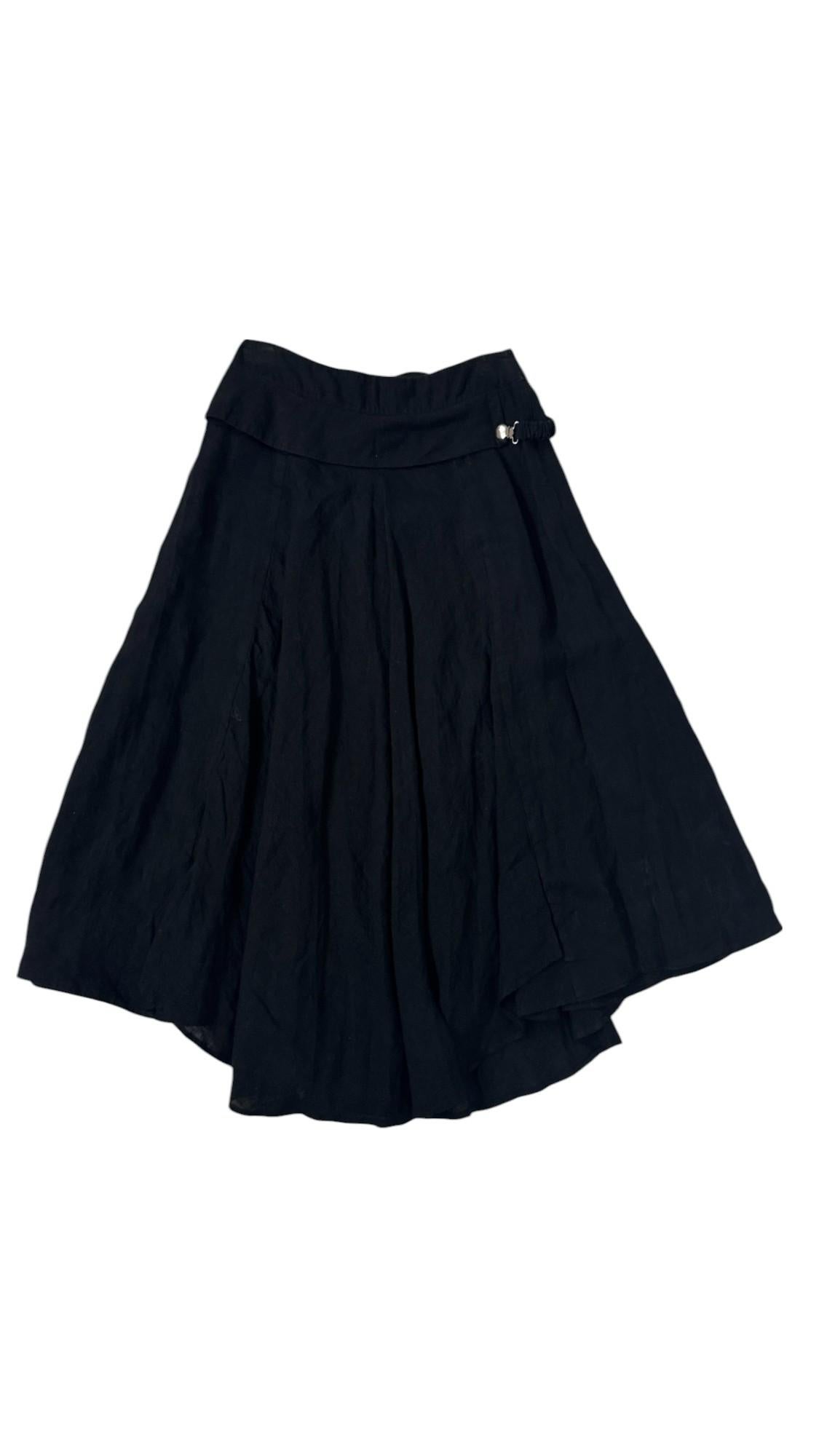 Crafted from 100% pure linen in deep black, this elegant maxi skirt by Sarah Pacini showcases the brand’s signature blend of minimalist sophistication and contemporary edge. The fluid, wide-cut silhouette is subtly asymmetric, offering graceful