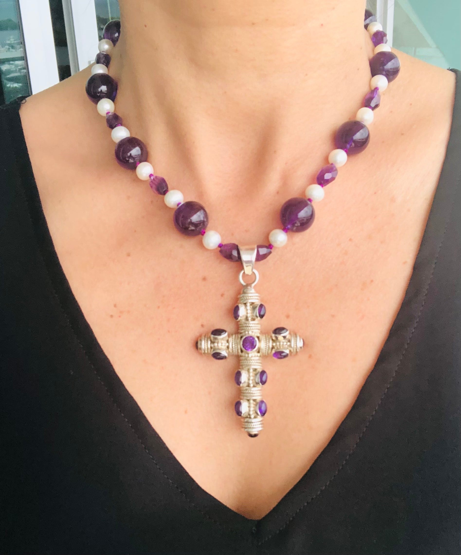One-of-a-Kind

Looking for a unique and handsome piece of jewelry? Look no further than this stunning Amethyst and Sterling Silver cross necklace, paired with a beautiful Amethyst and Pearl necklace.

The focal point of this necklace is the heavy