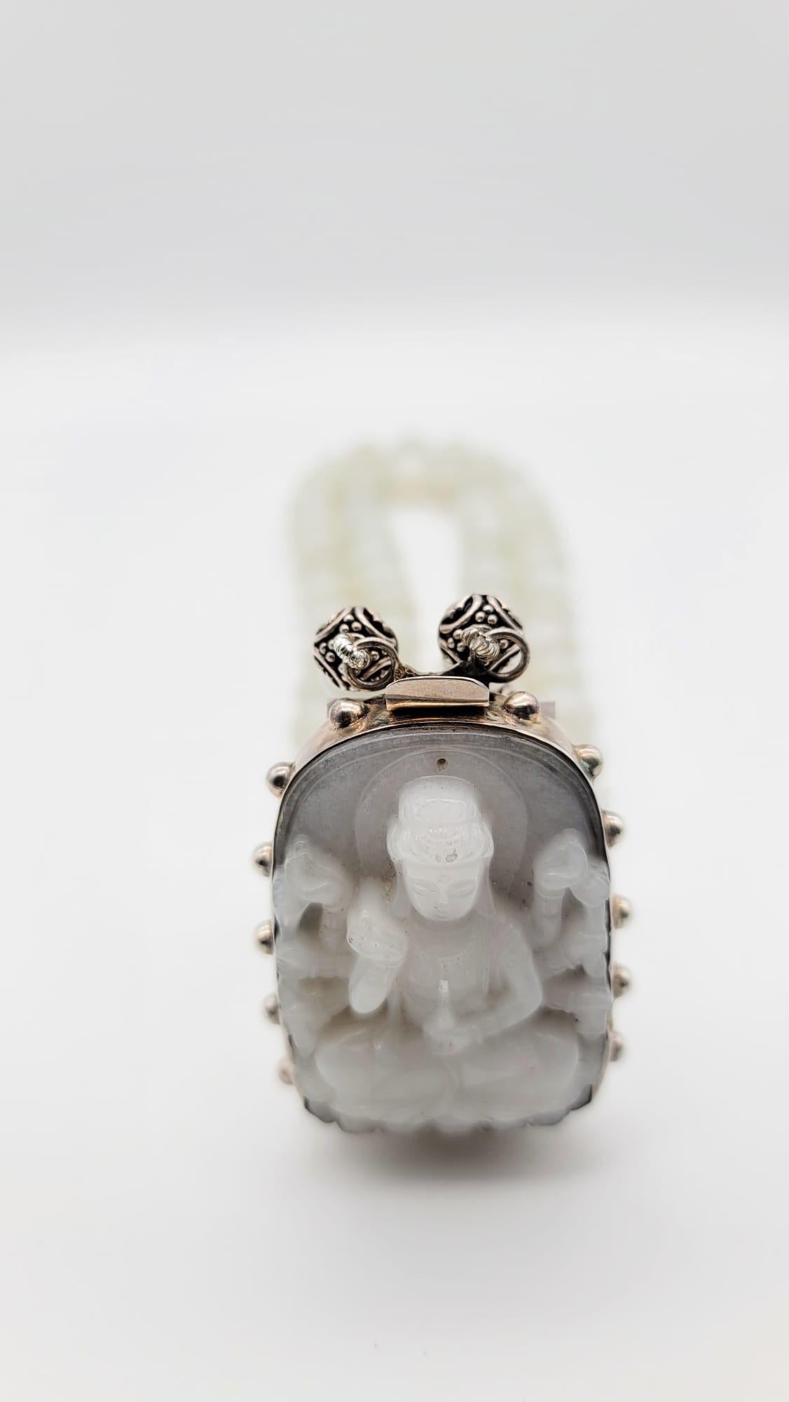 A.Jeschel Carved Guan Yin surrounded by 2 strands of match Moonstone beads 7