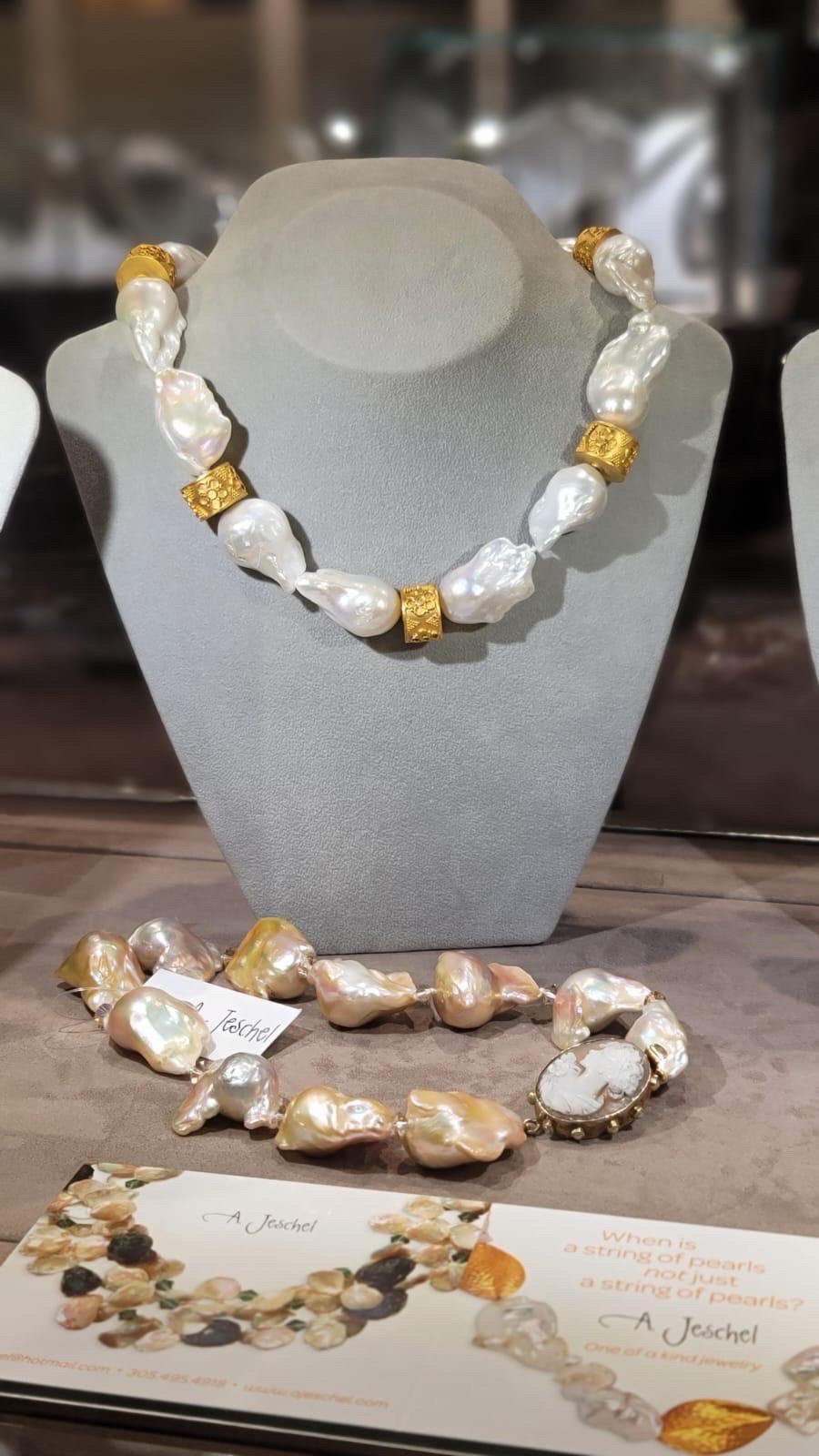One-of-a-Kind

What could be simpler or more beautiful?
17-22 m.m Fine quality super lustrous white Pearls says it all. This is just a show-stopping Pearl necklace. The pearls are accented with Filigree vermeil rondels. The clasp is a simple Swiss