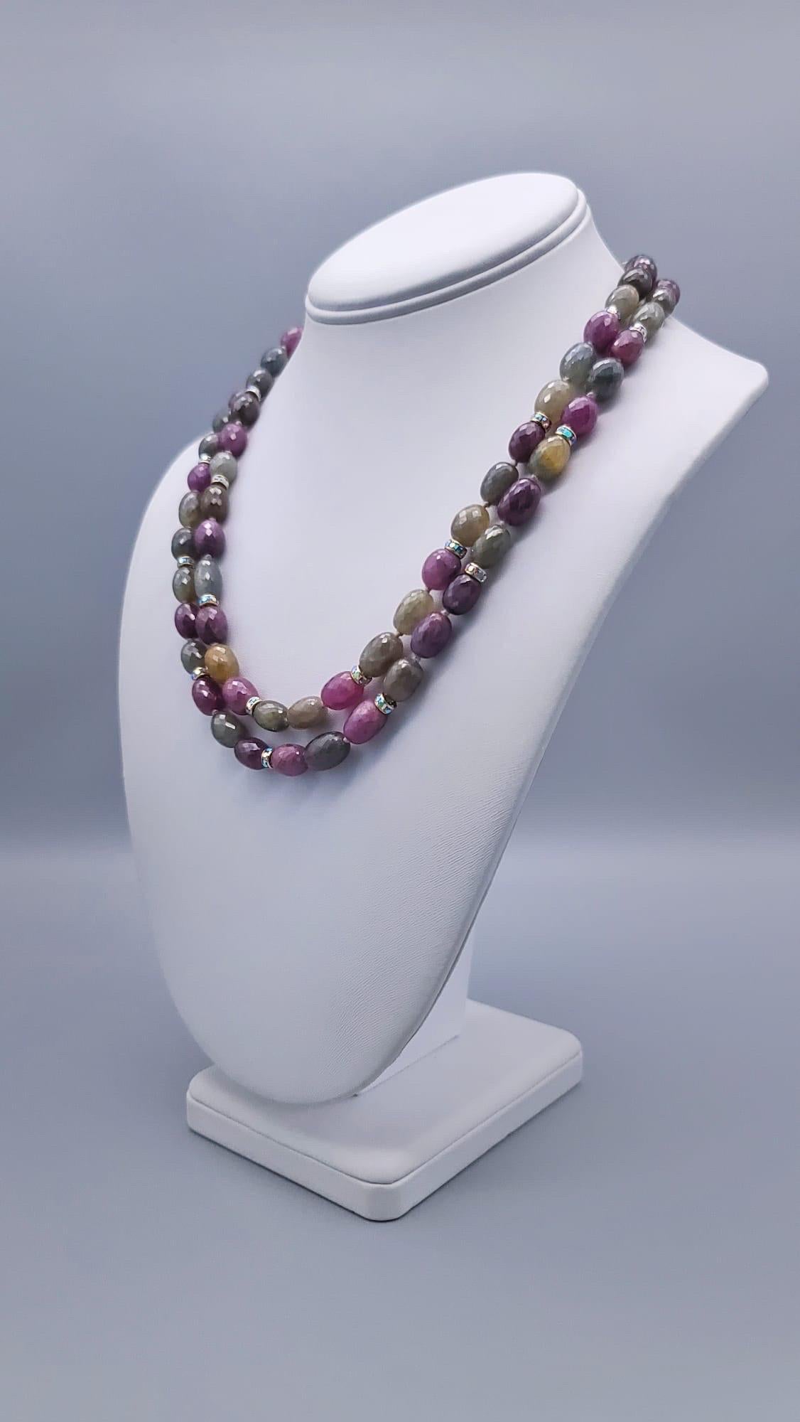 One-of-a-Kind

Just in case you always expect Sapphire to be blue here is a double strand of rich green and pink faceted sapphires nested together with CZ rondels for added brightness. The beads are hand-knotted with silk. The clasp is vermeil with