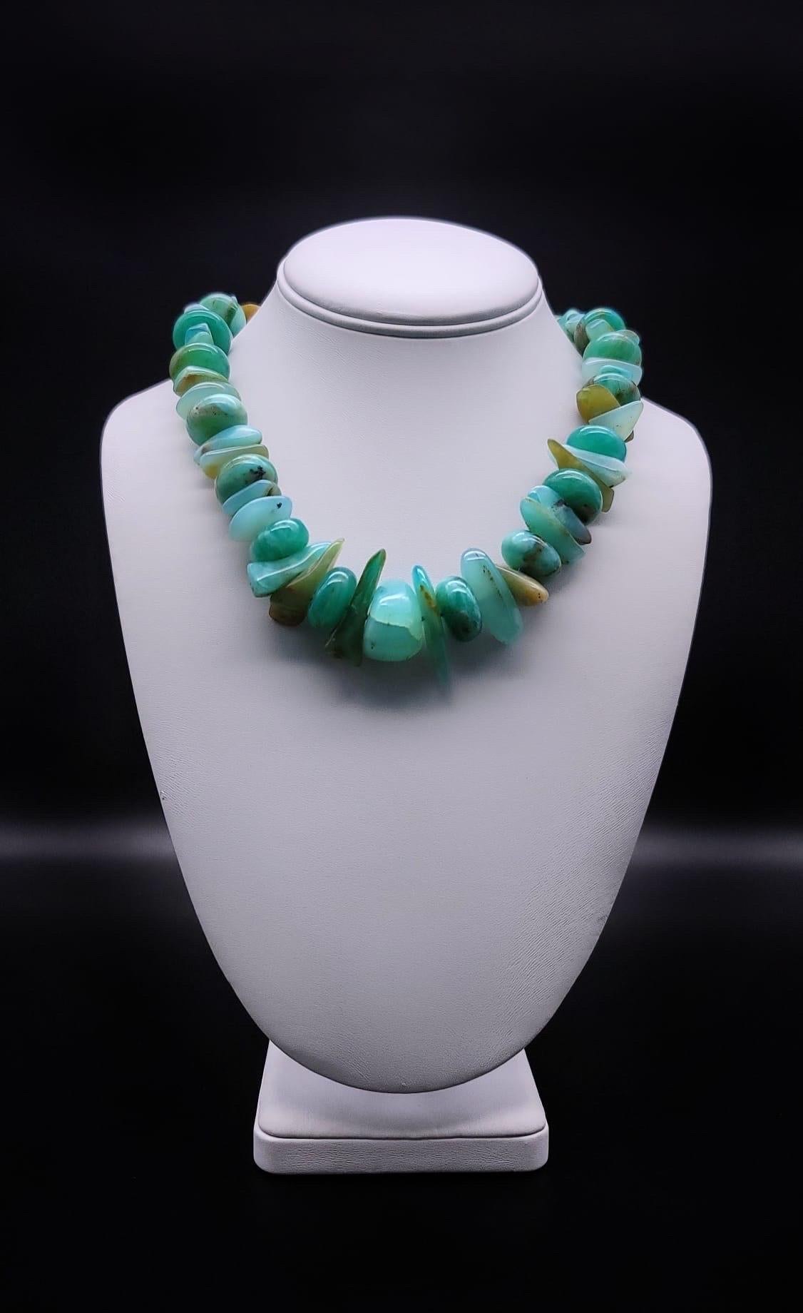 One-of-a-Kind

Rare Peruvian Blue Opal Necklace. 
These stones can only be found in the Andes Mountains. Generally translucent, the color is described as similar to the Caribbean Sea with a vitreous to pearly luster.A truly gorgeous mix of light to