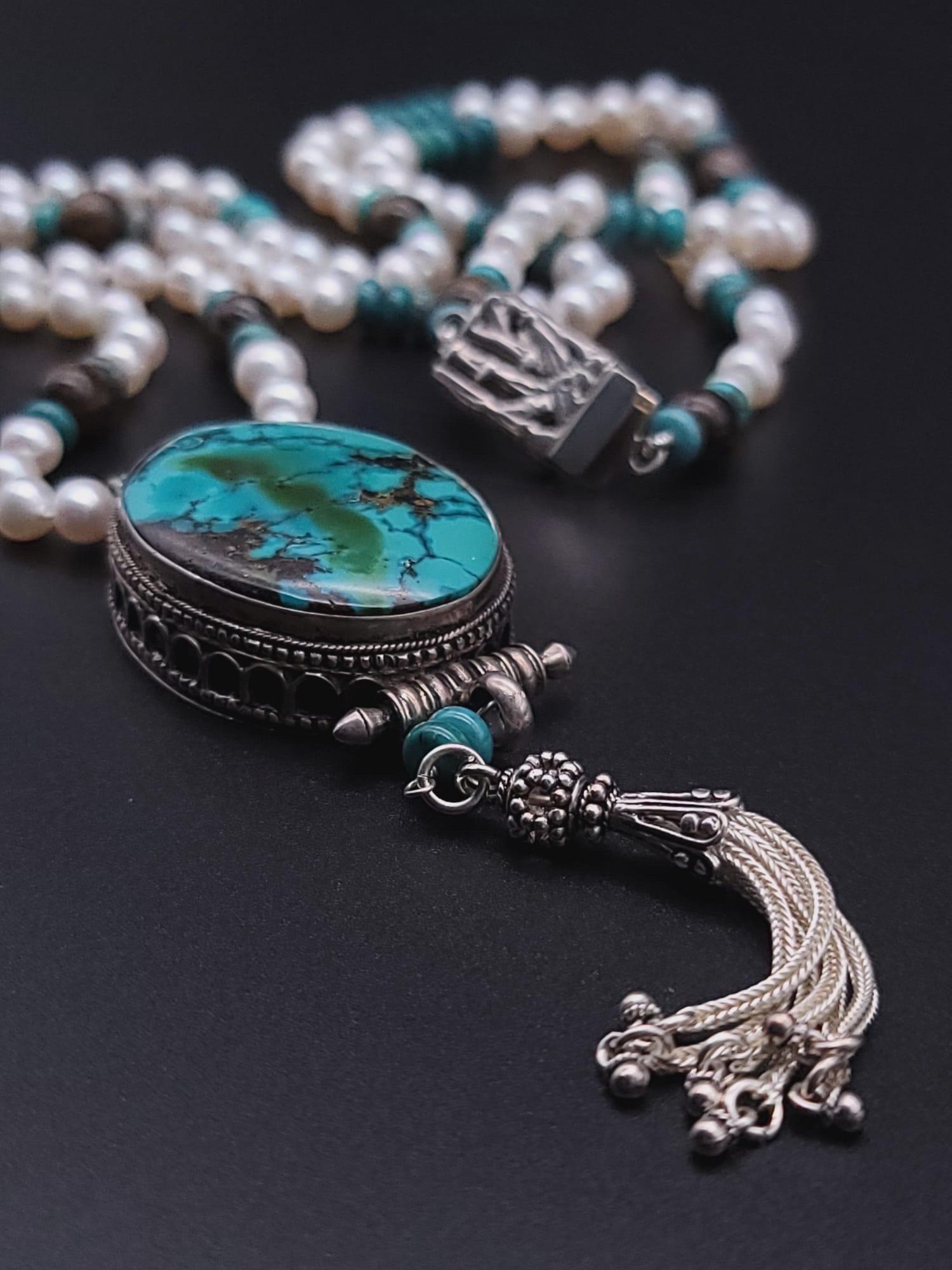 A.Jeschel Sophisticated long freswater Pearl necklace with Turquoise pendant. In New Condition For Sale In Miami, FL