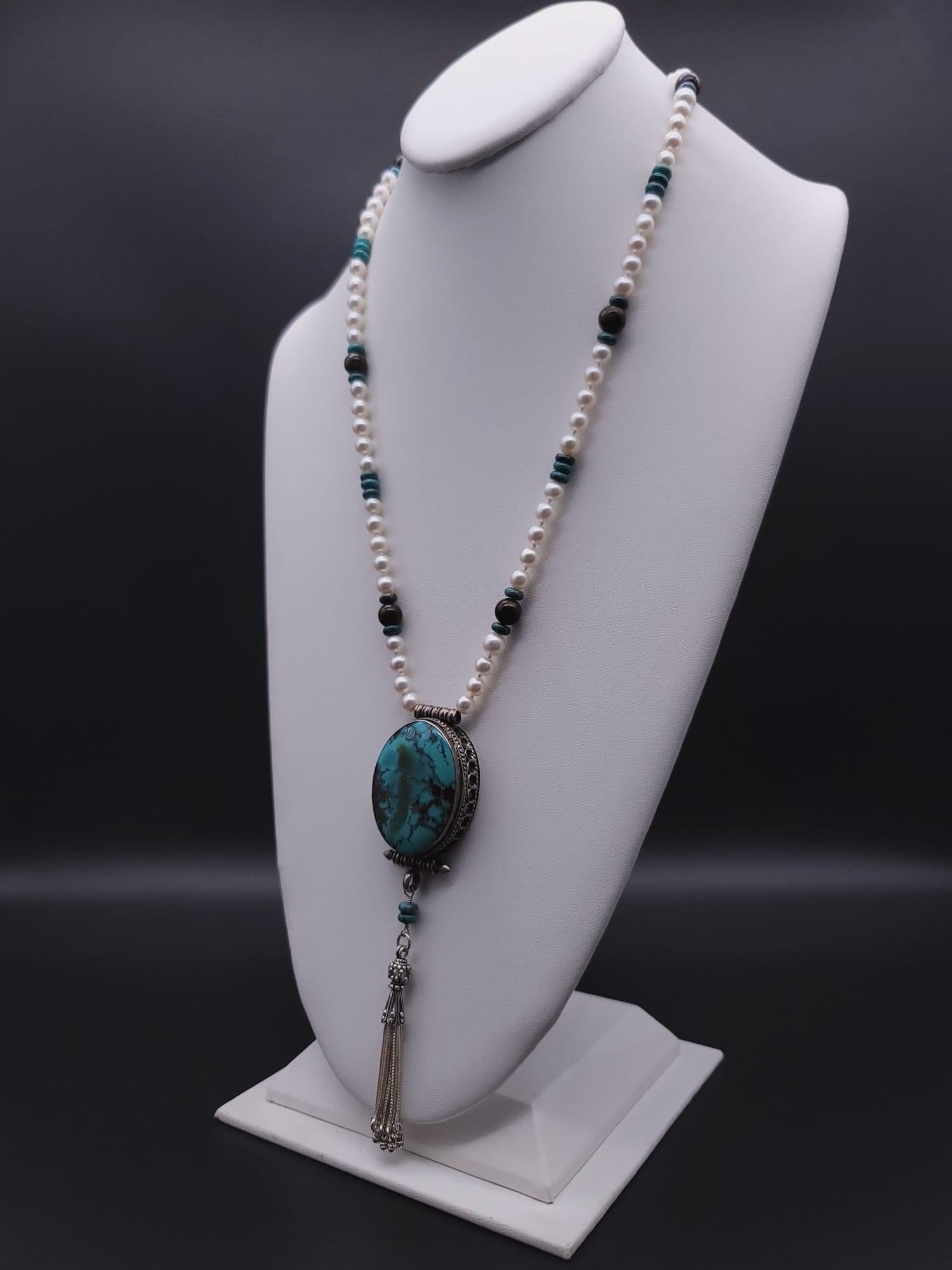 Contemporary A.Jeschel Sophisticated long freswater Pearl necklace with Turquoise pendant. For Sale