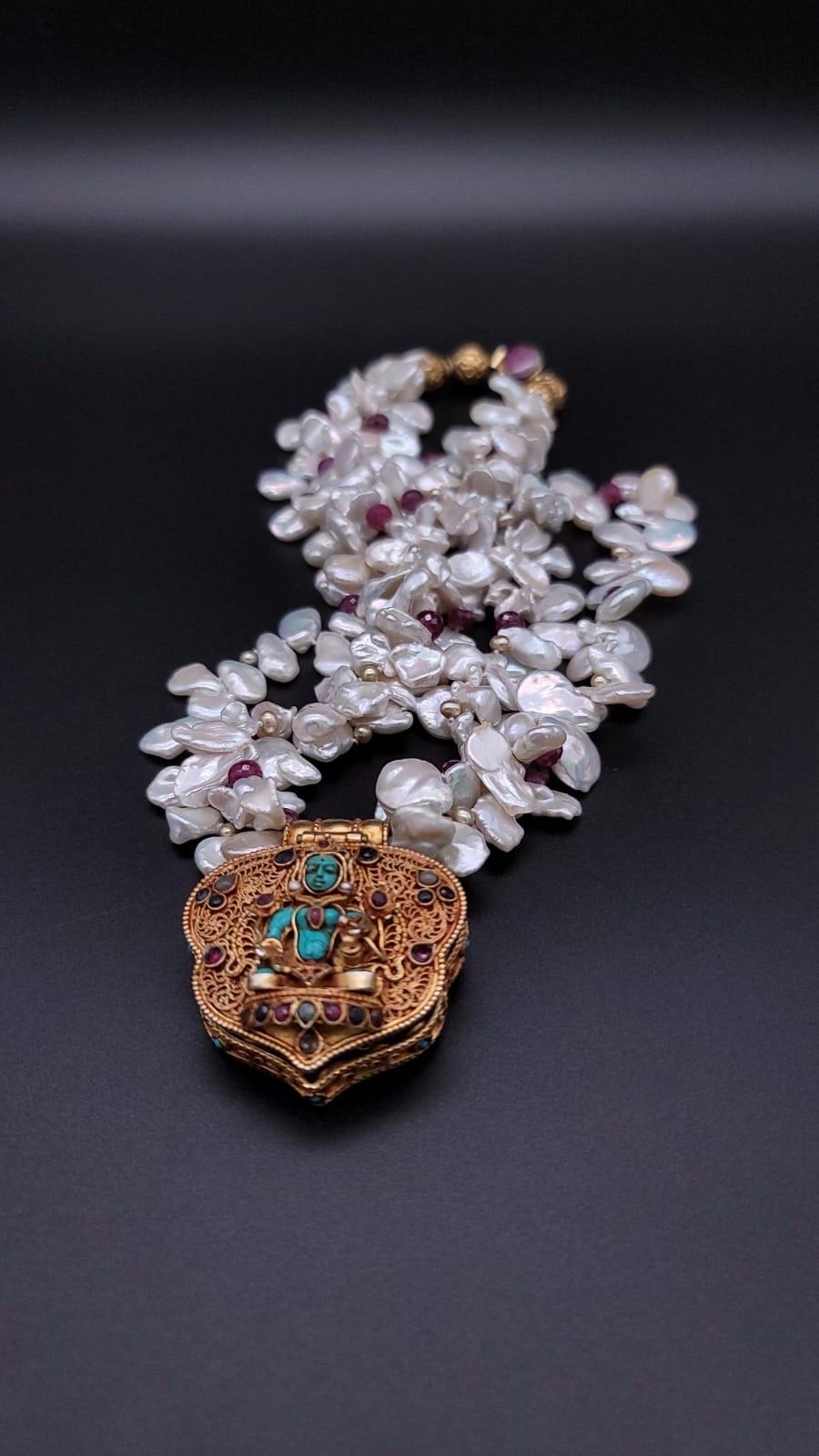 Mixed Cut A.Jeschel  Stunning Vintage Ghau Box suspended from a Pearl and Ruby Necklace. For Sale