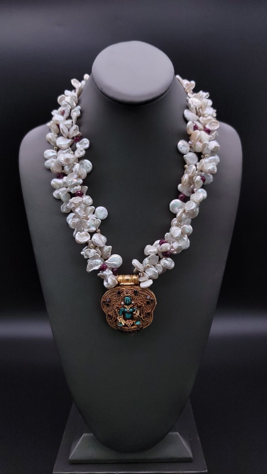 A.Jeschel  Stunning Vintage Ghau Box suspended from a Pearl and Ruby Necklace.