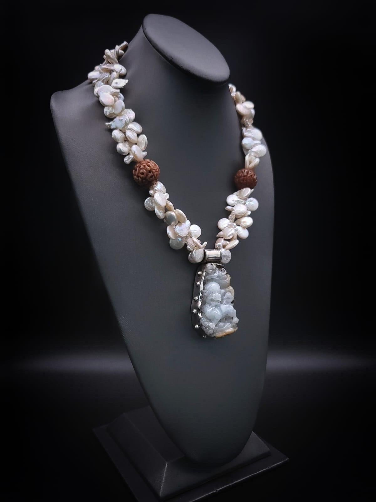 Mixed Cut A.Jeschel Pearl necklace with a statement jade pendant. For Sale
