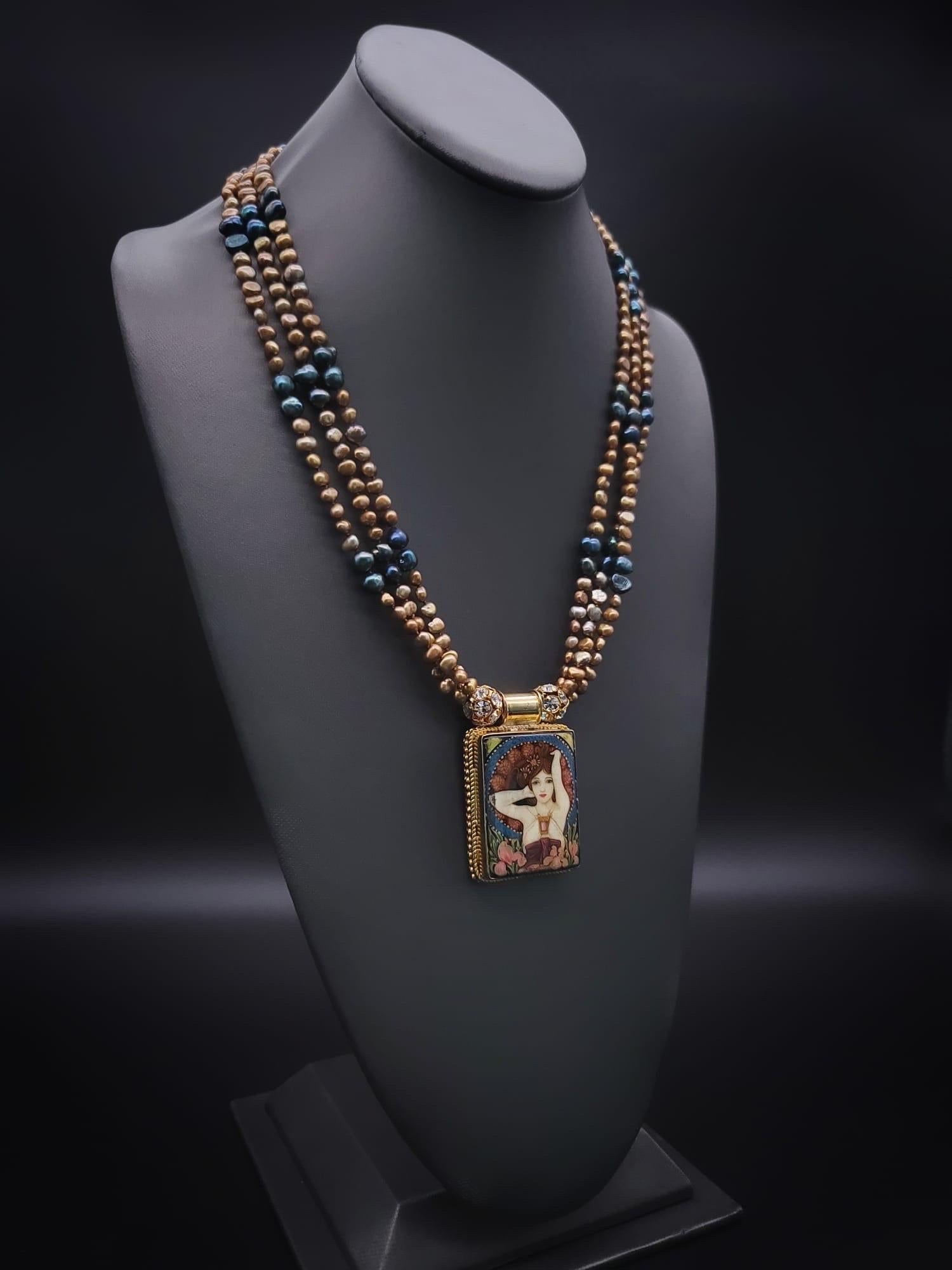 Contemporary A.Jeschel Fine hand-painted Art Deco enamel pendant and Peacock Pearl necklace. For Sale