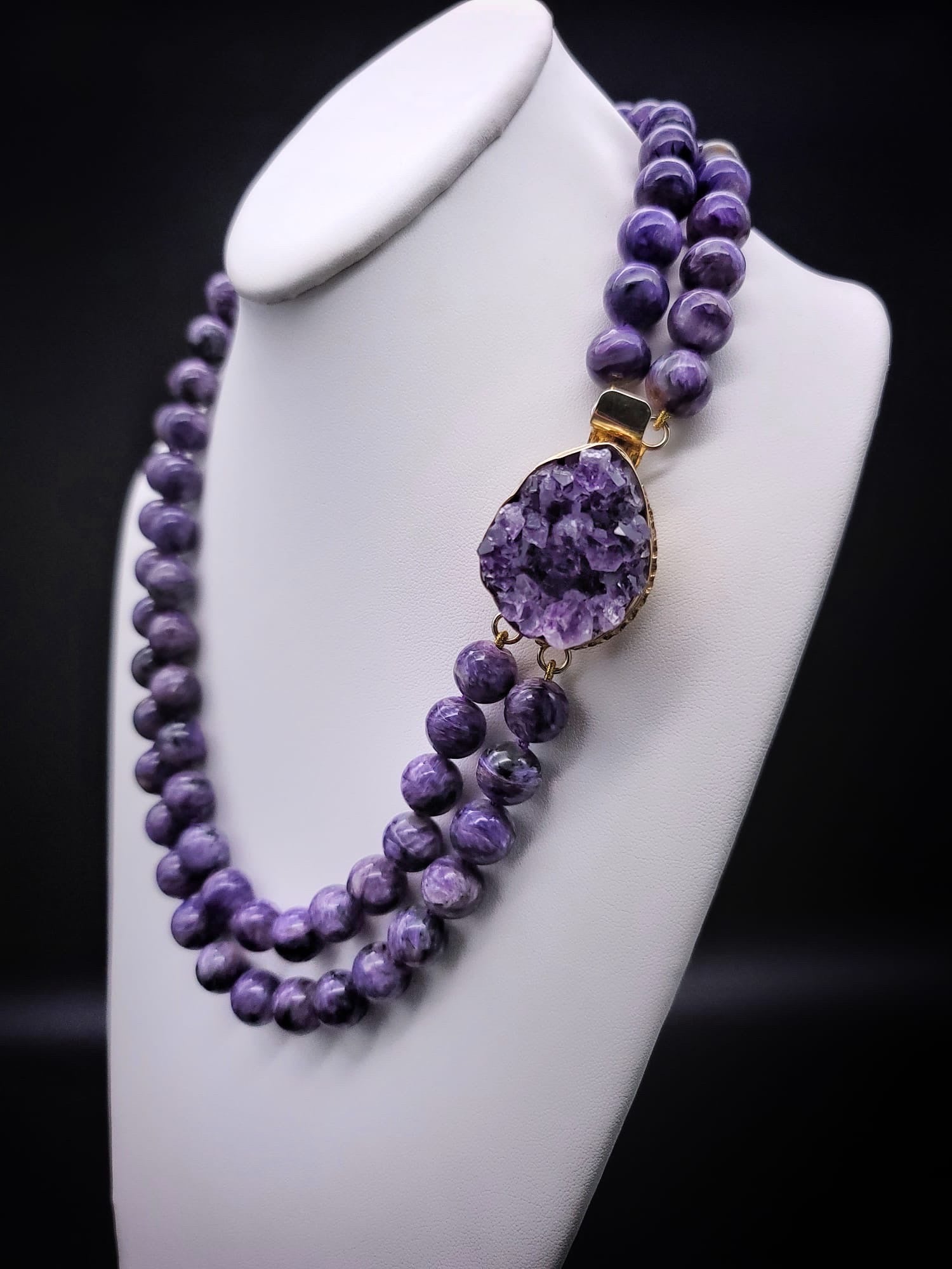 One-of-a-Kind
The perfect purple necklace. Charoite is a relatively recent discovery (1978) is a beautiful purple stone found only in Siberia.The perfectly matched set of beads clasped by a unique large amethyst Geo complimenting the rich purple of