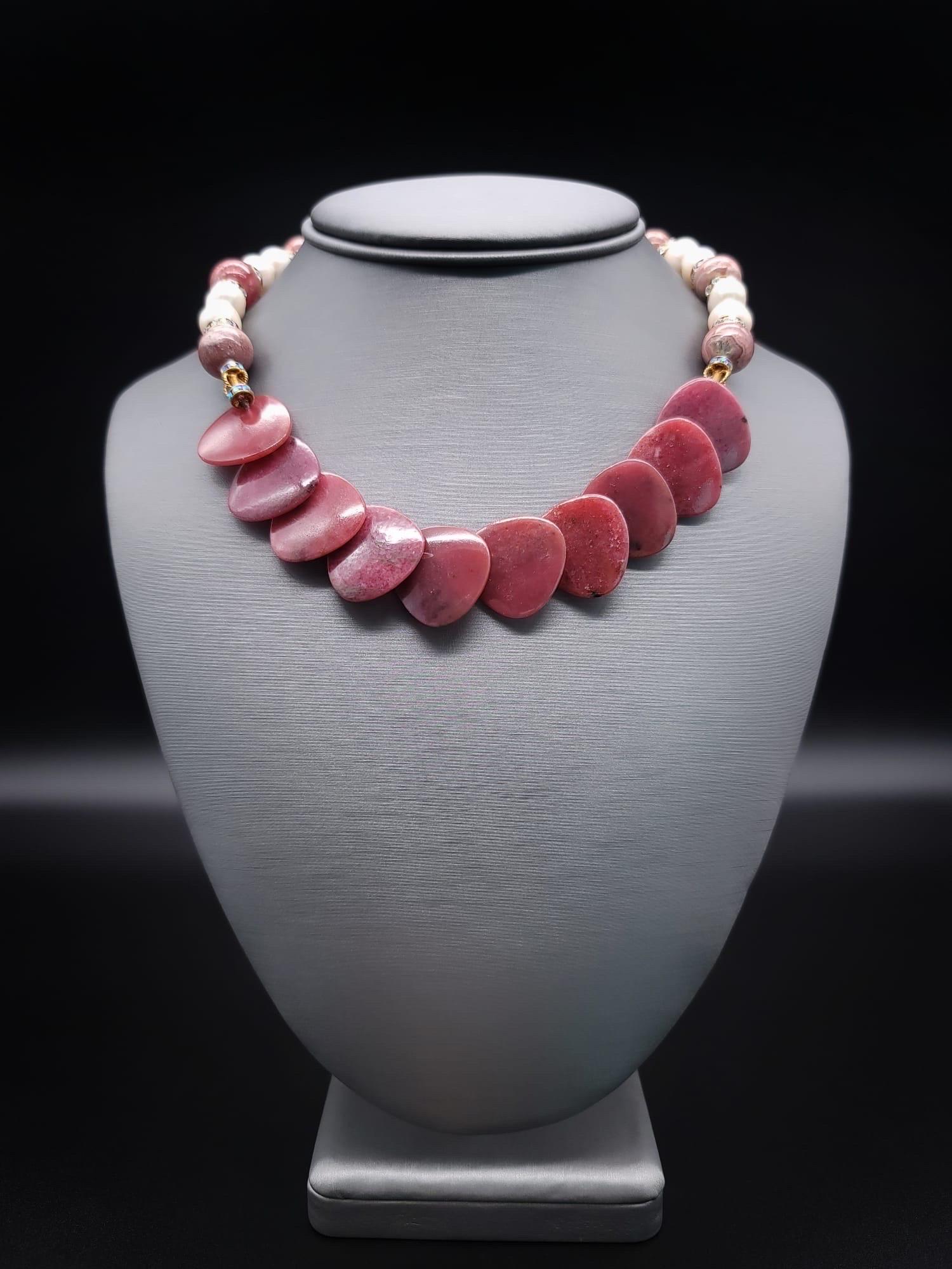 Contemporary A.Jeschel Several varieties of Rhodocrosite in an unusual mix necklace.