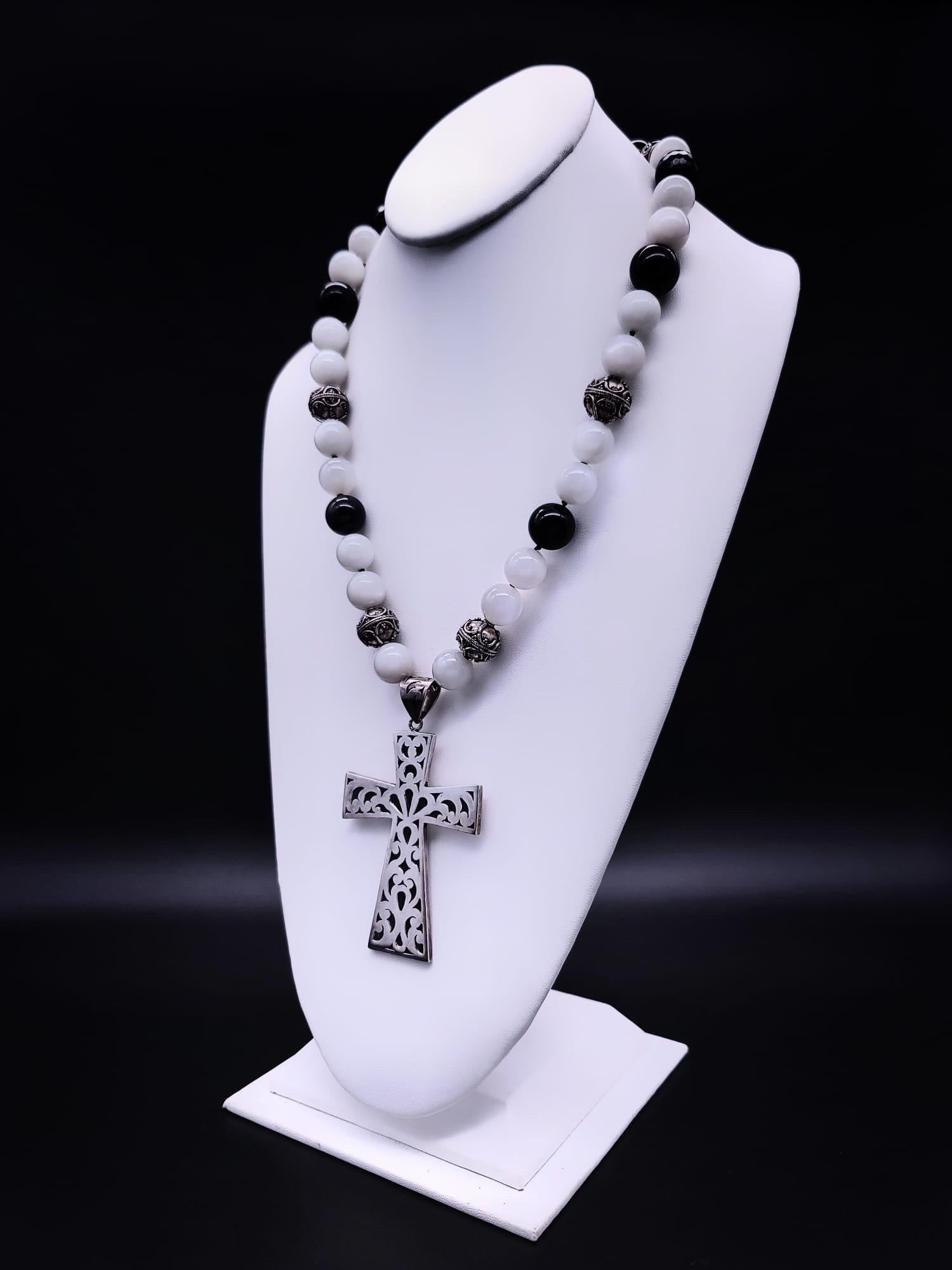 Contemporary A.Jeschel Large Sterling Silver Cross hangs from a Moonstone and Onyx Necklace For Sale