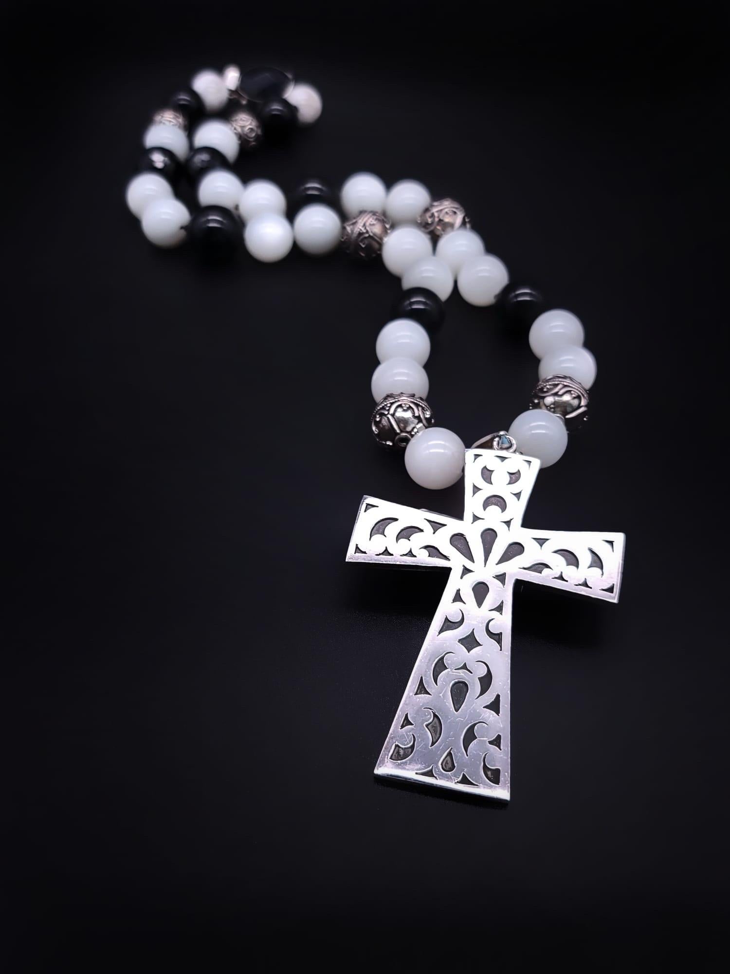 A.Jeschel Large Sterling Silver Cross hangs from a Moonstone and Onyx Necklace In New Condition For Sale In Miami, FL