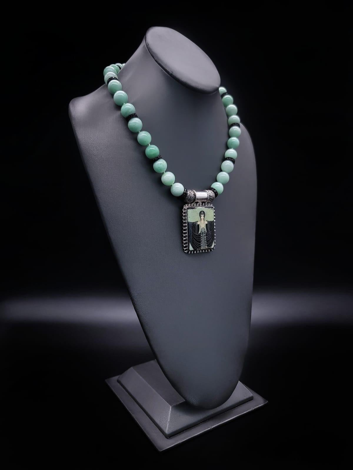 Mixed Cut A.Jeschel Green Moonstone necklace with Erte Art Deco pendant . For Sale