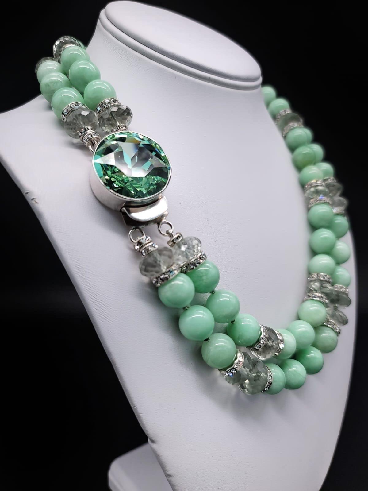 Contemporary A.Jeschel Enchanted Green Moonstone with a signature clasp necklace. For Sale
