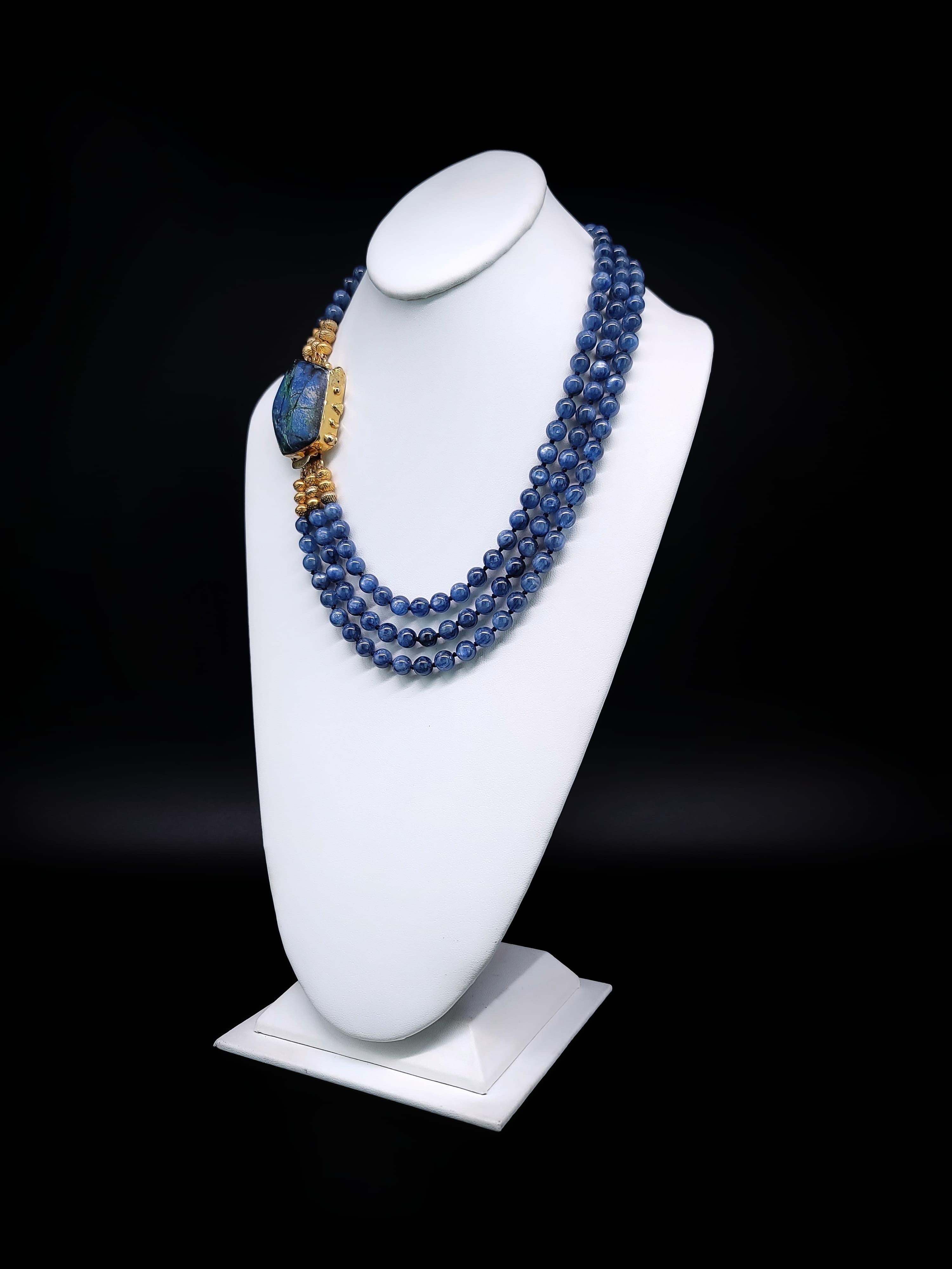 Elevate your jewelry collection with a truly exceptional piece - our one-of-a-kind necklace featuring three strands of exquisitely matched 8 mm rich blue Kyanite beads. Each bead is a testament to nature's artistry, showcasing the captivating allure