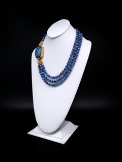 A.Jeschel Polished Kyanite beads necklace with a Chrysocolla clasp.