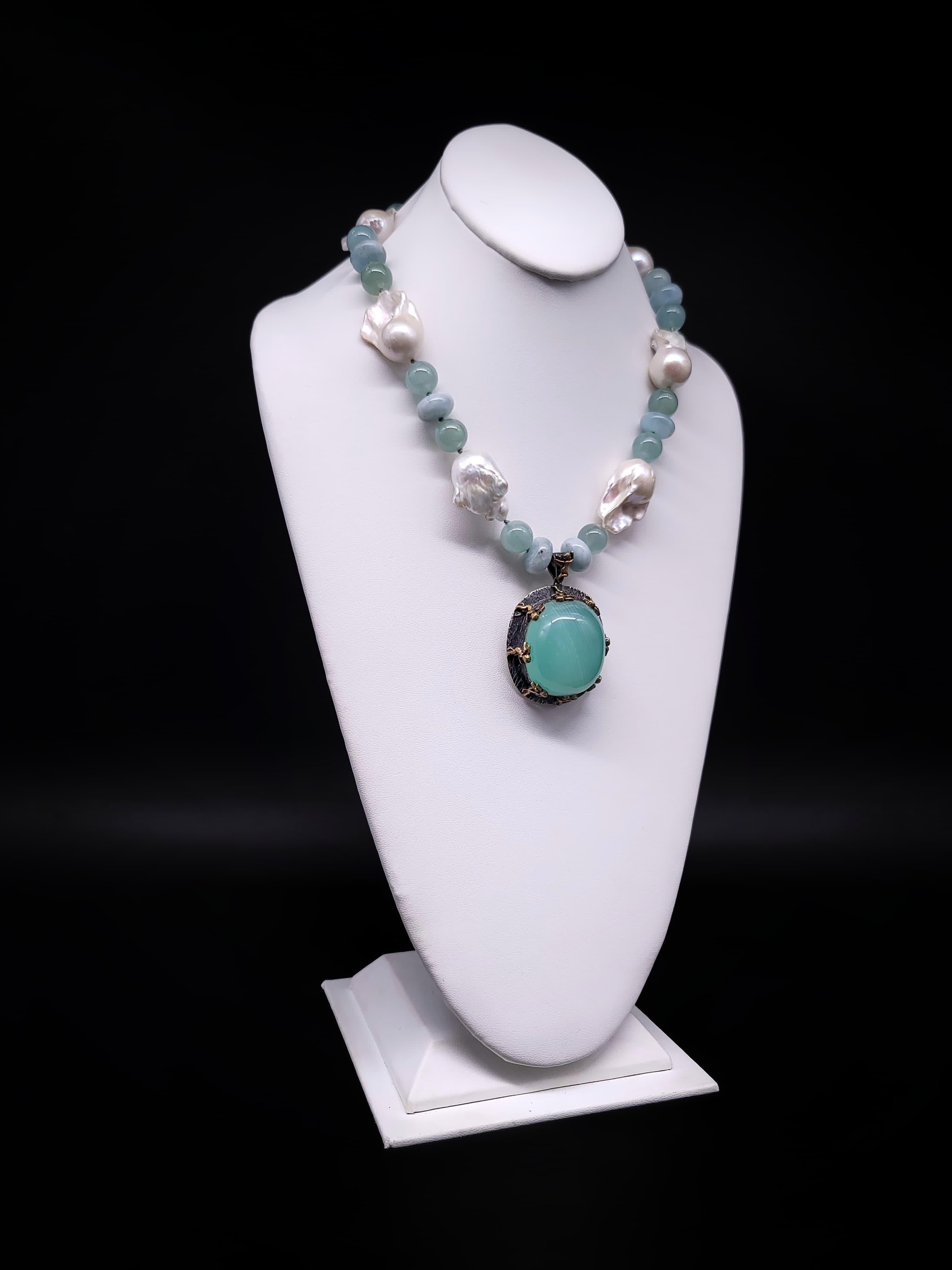 One-of-a-Kind

This exceptional piece of jewelry is a one-of-a-kind, (Pendant designed by Bora ) Sterling Silver pendant necklace that showcases a breathtaking Aquamarine gemstone held up by eight charming Cupids. The pendant has been meticulously