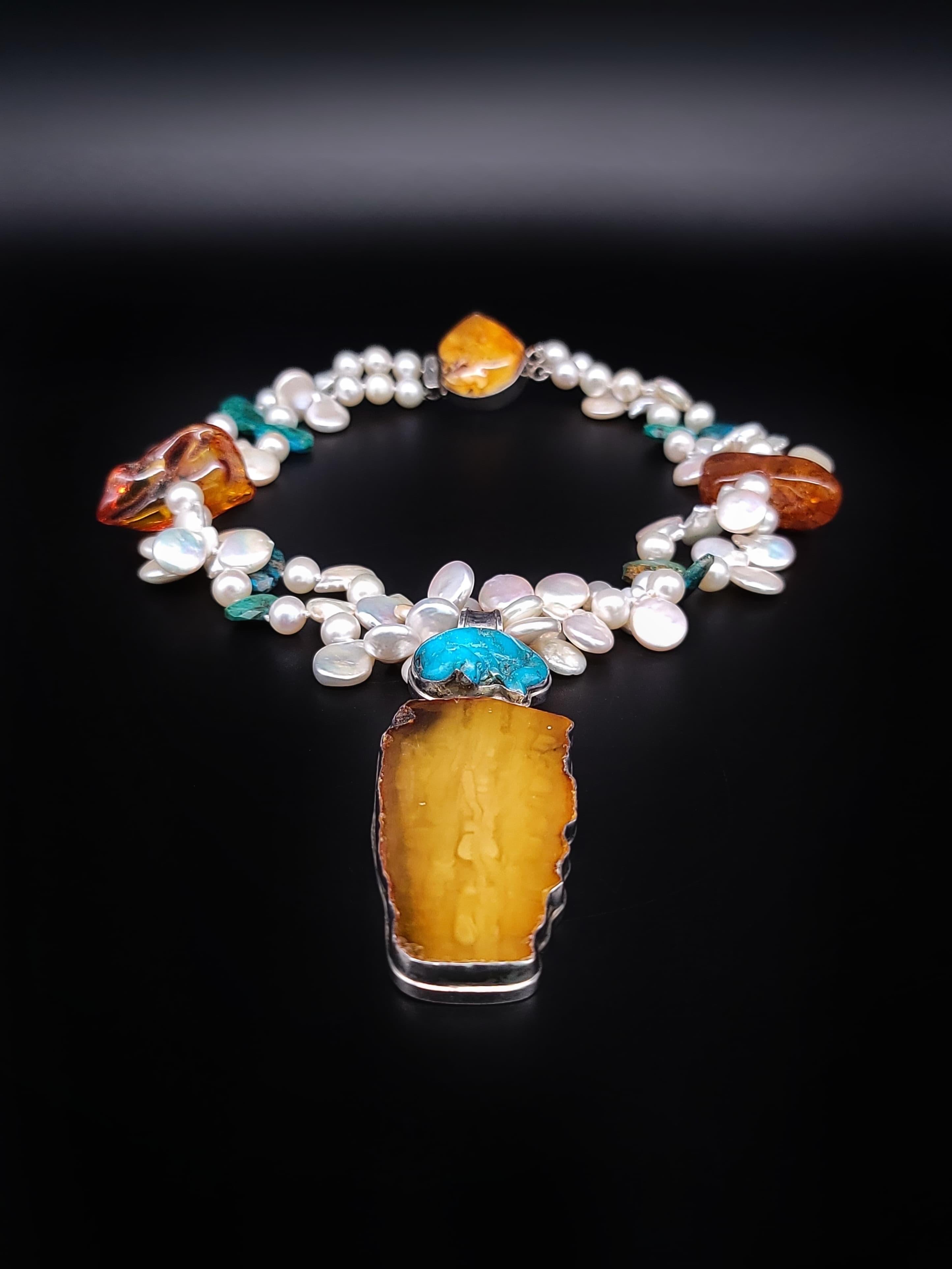 Contemporary A.Jeschel Pearl necklace with spectacular Amber pendant. For Sale