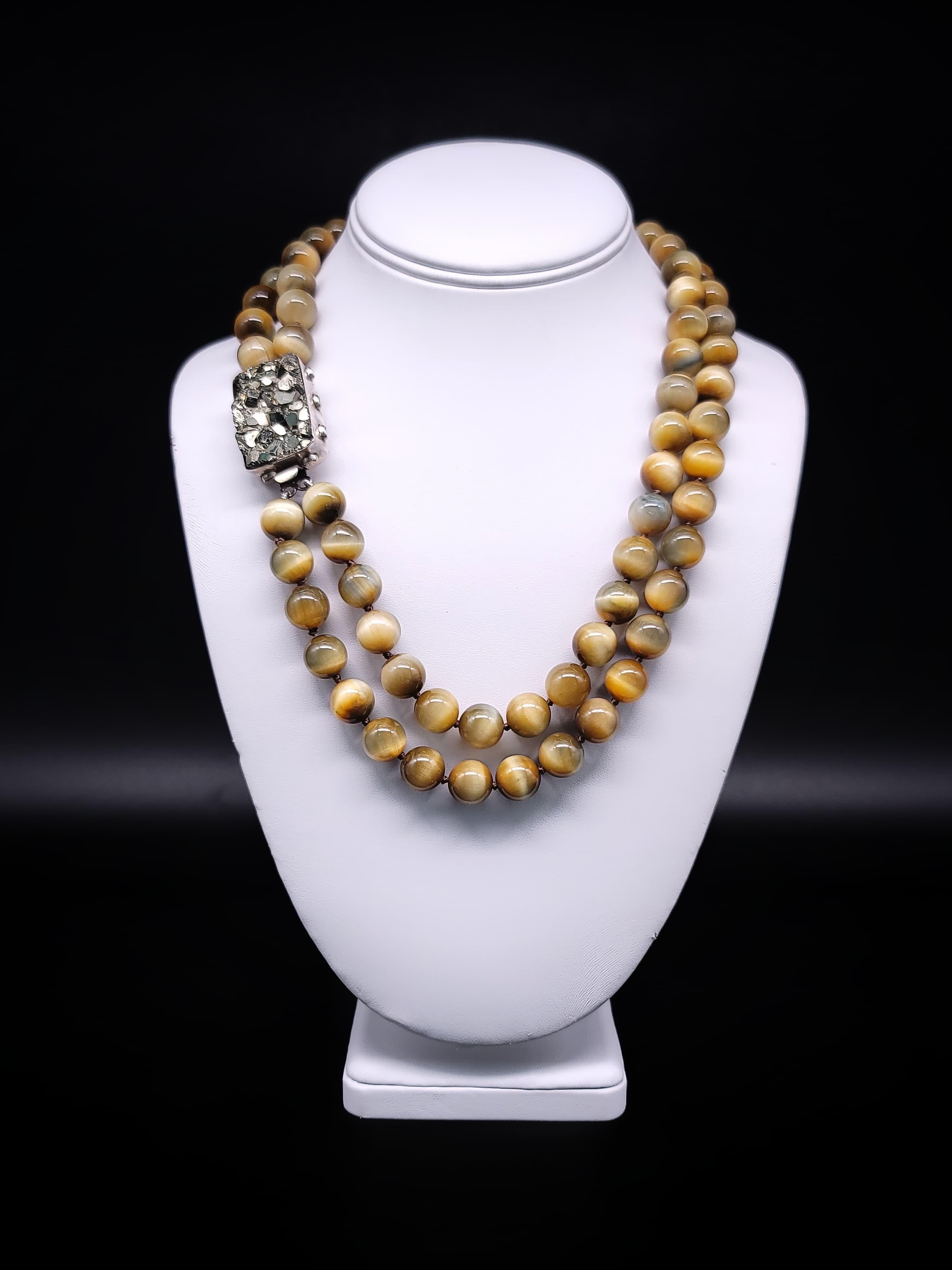 Contemporary A.Jeschel Honey Tiger’s eye necklace combined with Pyrite clasp. For Sale