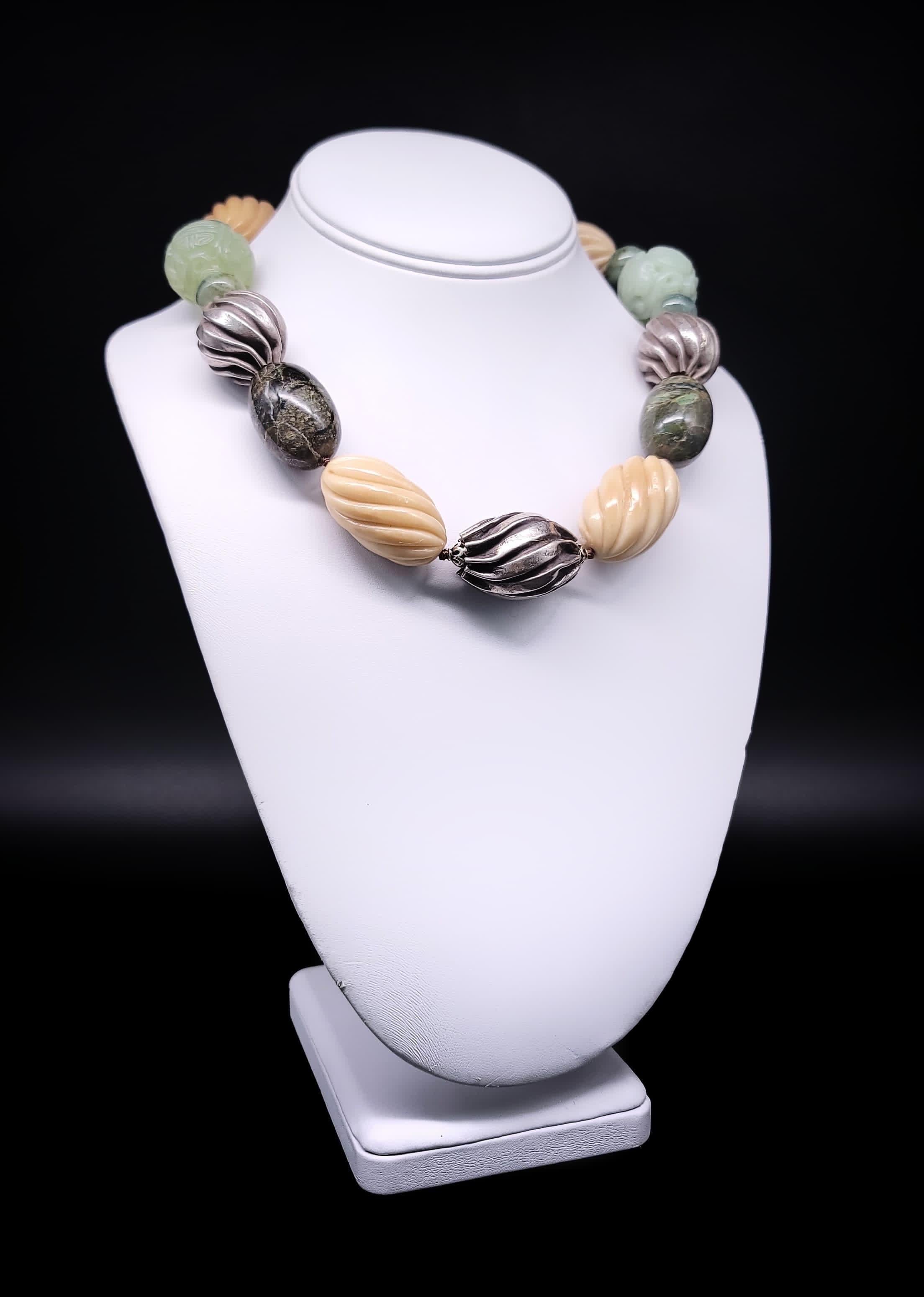 One-of-a-Kind

Experience the epitome of elegance with this exquisite necklace, crafted from polished Peruvian Opals, intricately carved green Jade longevity beads, and smaller jade spacers, all accentuated with delicately carved bone and adorned