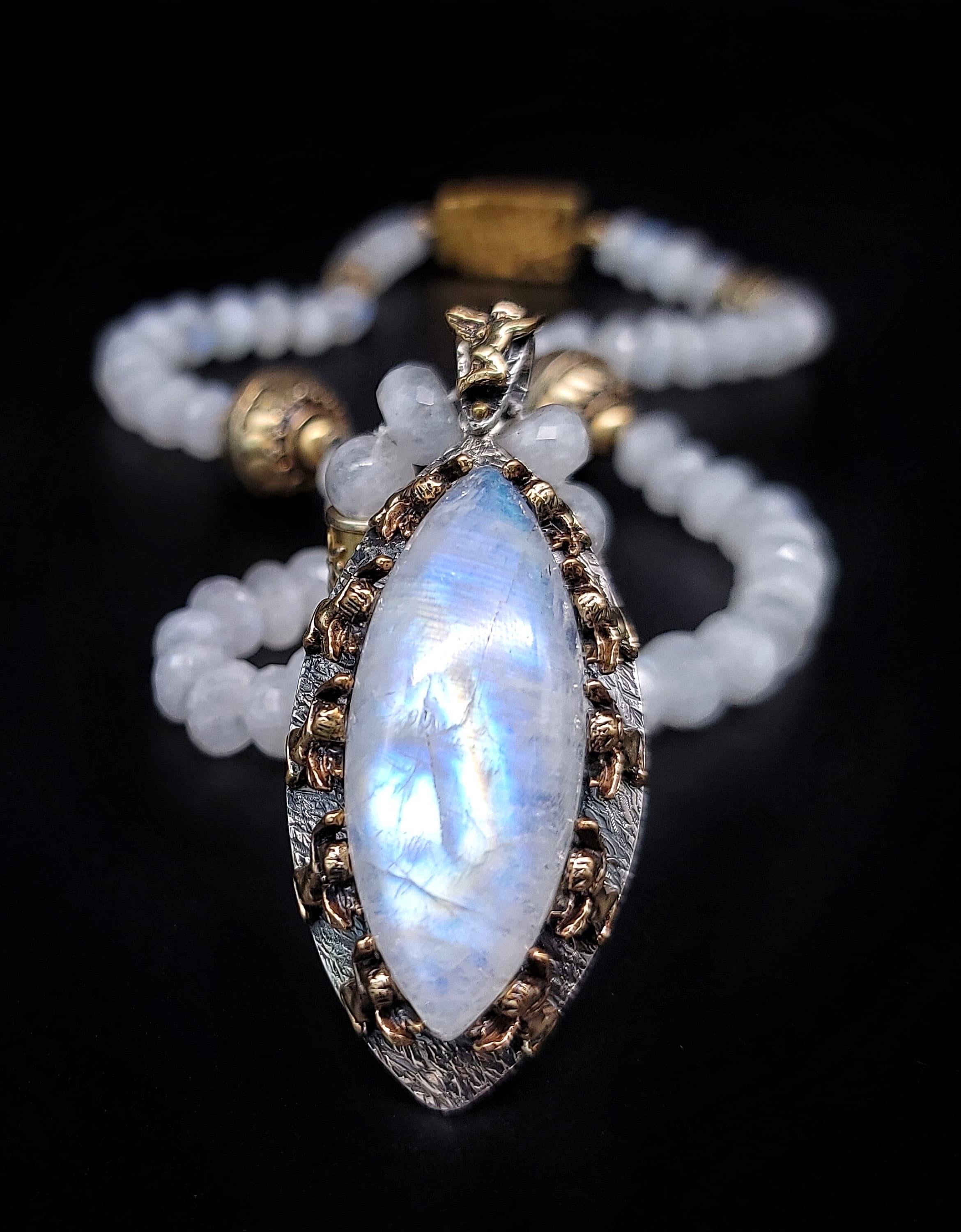 Mixed Cut A.Jeschel Rainbow Moonstone necklace set in a beautiful hand-crafted pendant.
