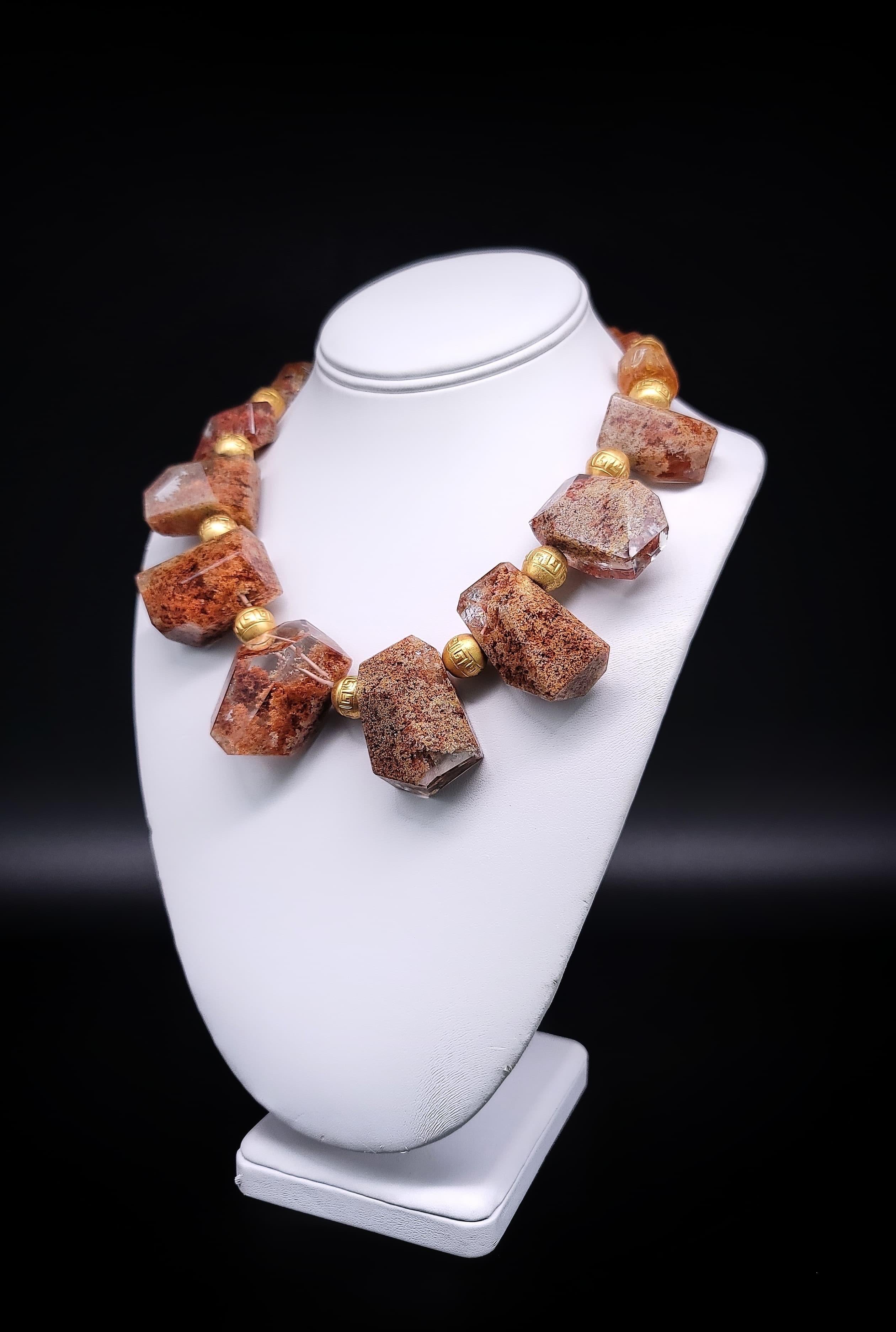 One-of-a-Kind

An extremely fine example of Garden Quartz aka Lodolite
which can only be found in the Minas Geras region of
Brazil and the stones in this highly polished necklace
sought after by collectors, as well as spiritual practitioners
who