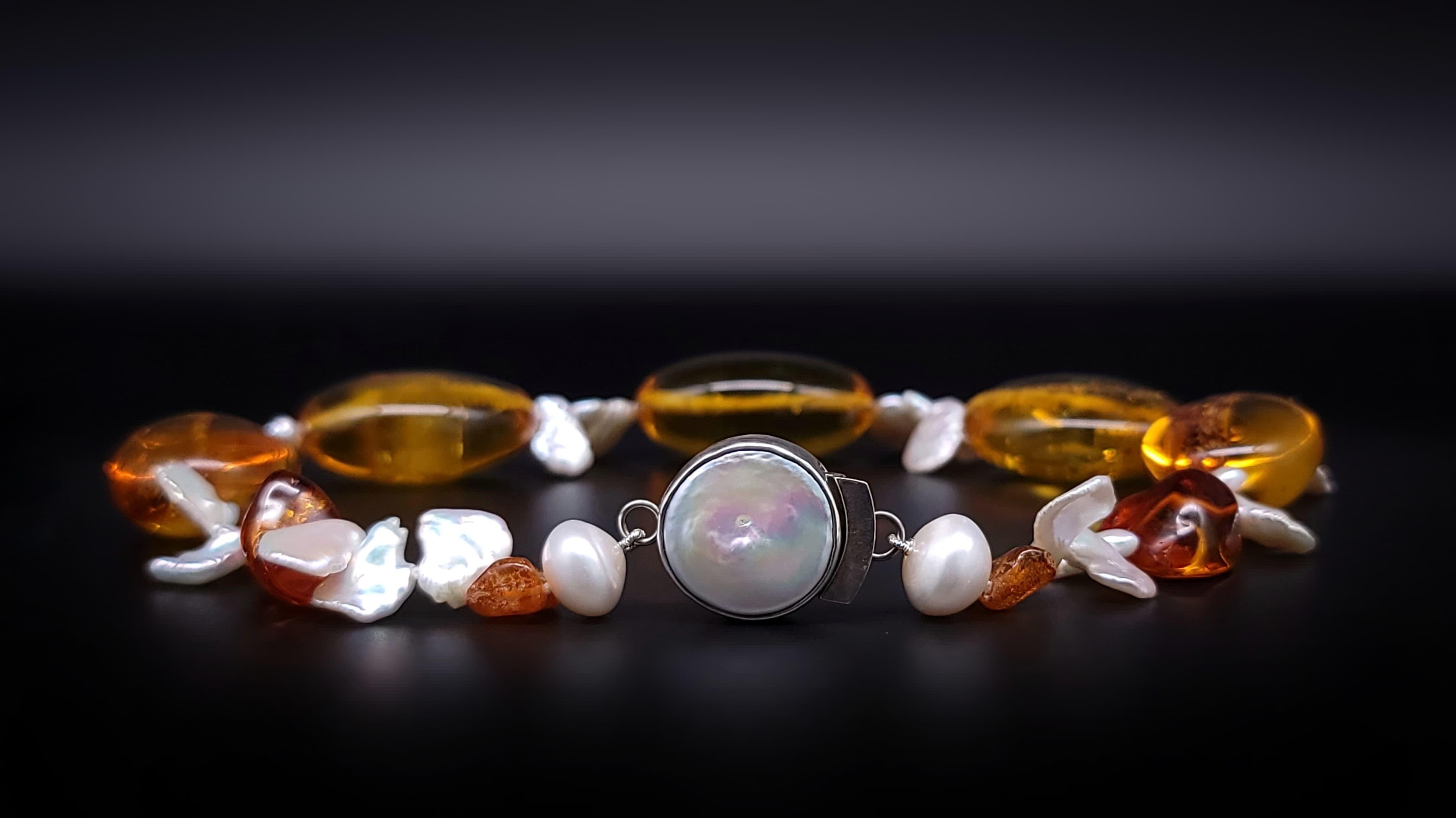 Contemporary A.Jeschel Baltic Amber and Keshi Pearl necklace. For Sale