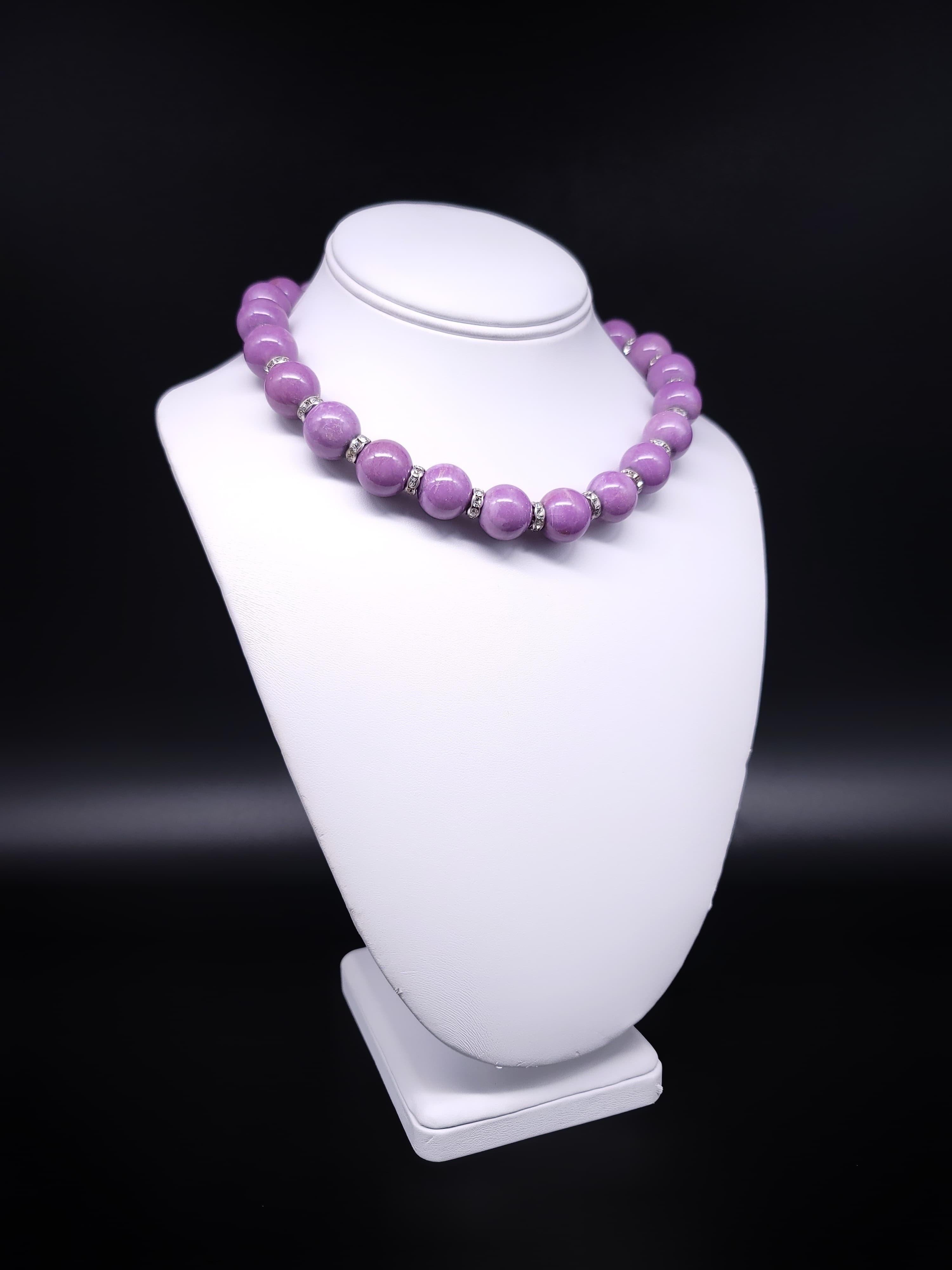 Unveil the beauty of a gem that might be new to your ears, but one that will capture your heart with its unique allure. Phosphosiderite, a stone with a name as enchanting as its appearance, showcases a captivating lilac hue that is not only a sight