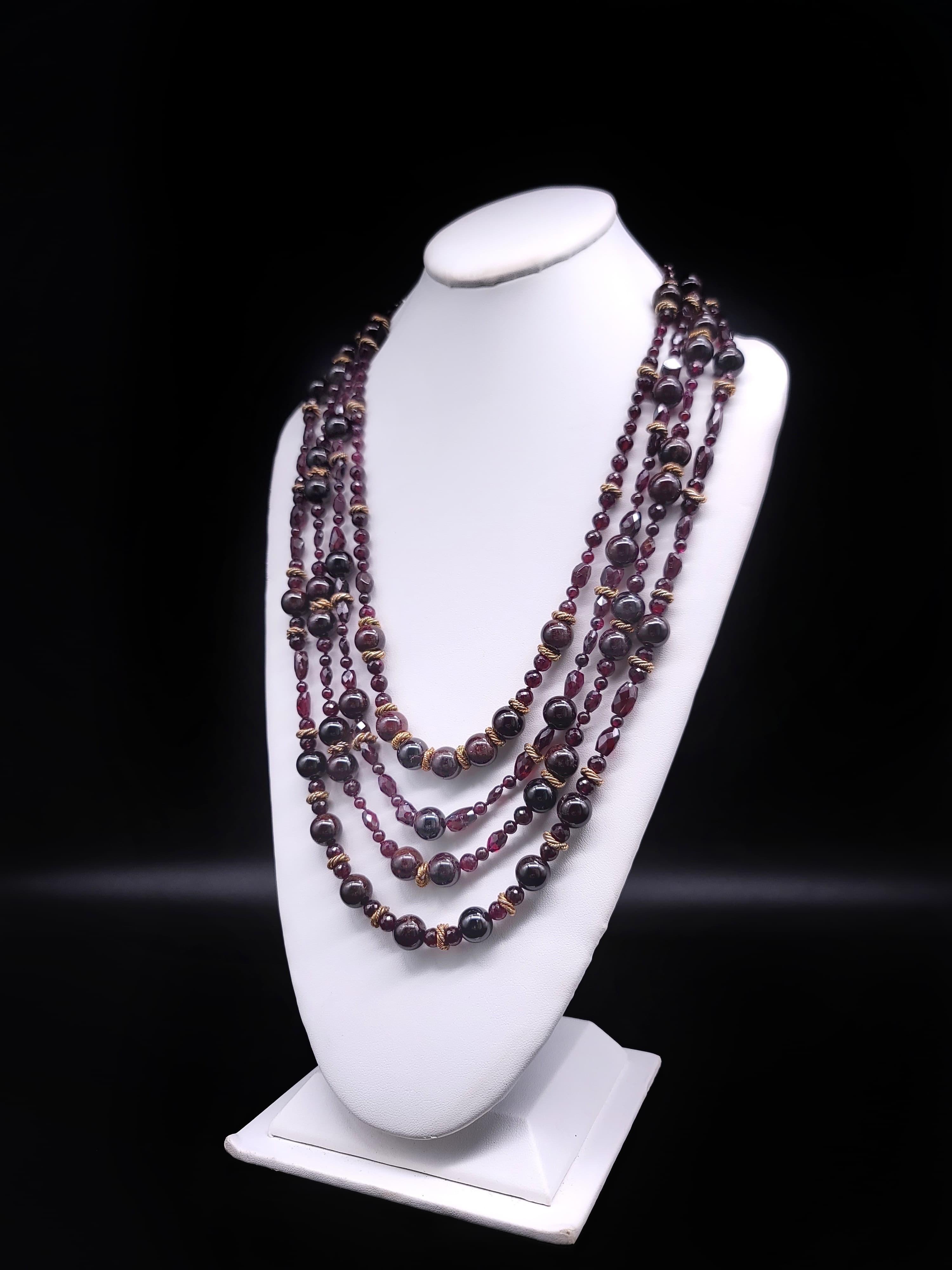 Contemporary A.Jeschel 4- strands of richly colored Garnet and vermeil necklace. For Sale