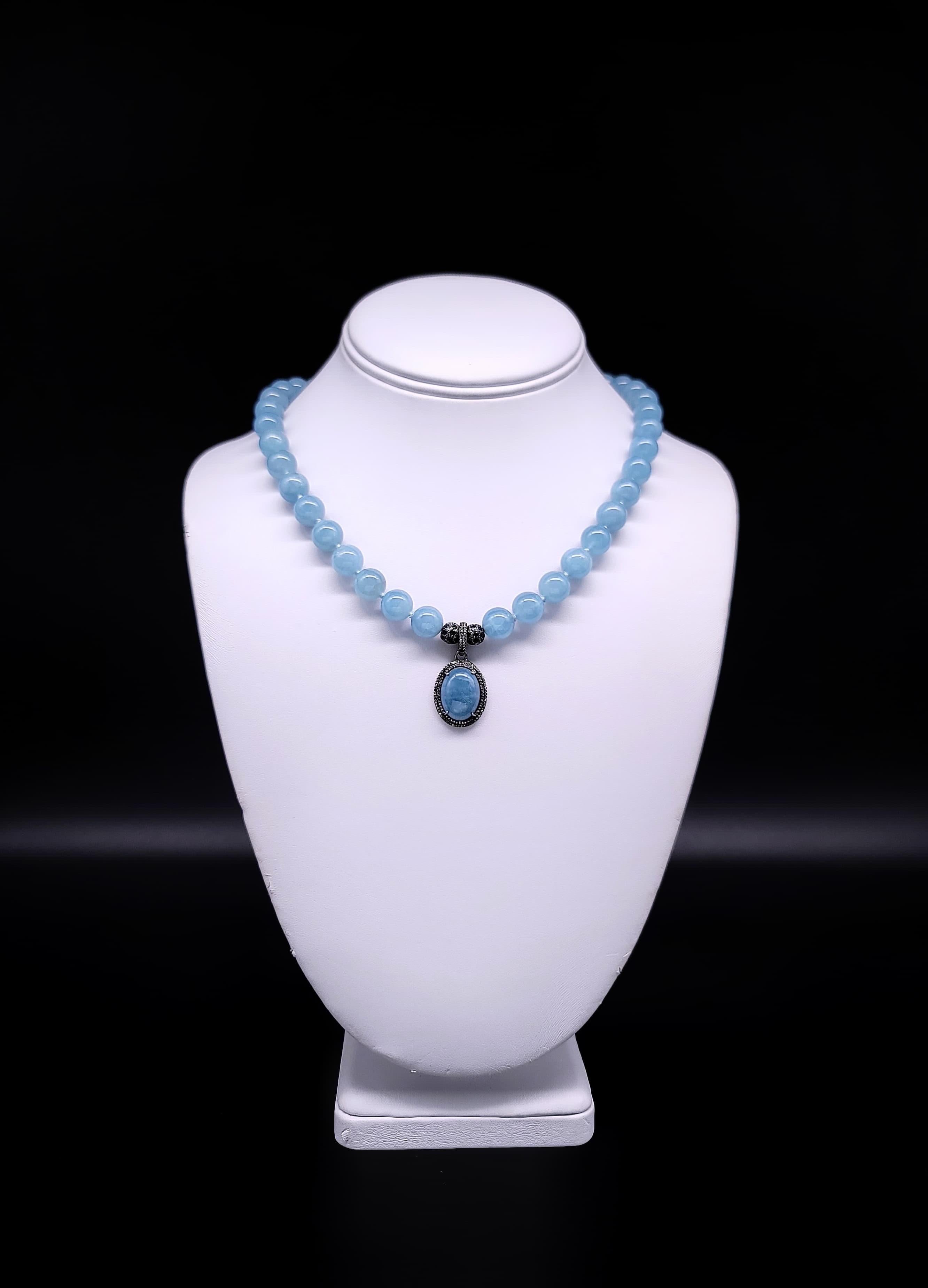 Exquisite Aquamarine Elegance: A Timeless Treasure

Indulge in the opulent allure of this one-of-a-kind necklace, where every detail is meticulously crafted to perfection. Picture yourself adorned with rich blue Aquamarine beads, each measuring