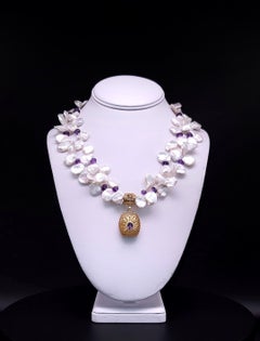 A.Jeschel Double strand Keshi Pearl with an Amethyst vermeil pendant.