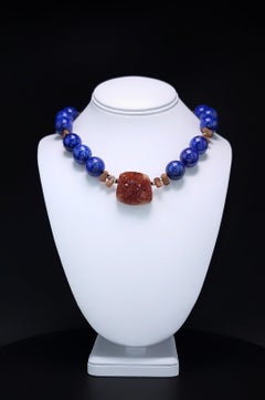 A.Jeschel, collier riche en lapis et citrine dorée.