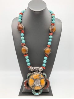 A.jeschel Statement and Unique Lotus Flower Tibetan Pendant Amber and Turquoise.