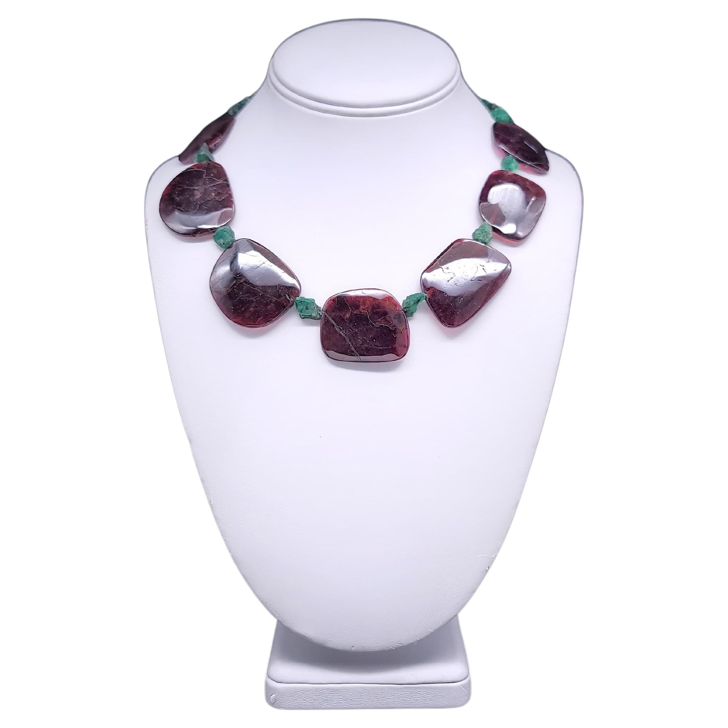 A.Jeschel Unique Polished Garnet Necklace separated by Emeralds nuggets For Sale