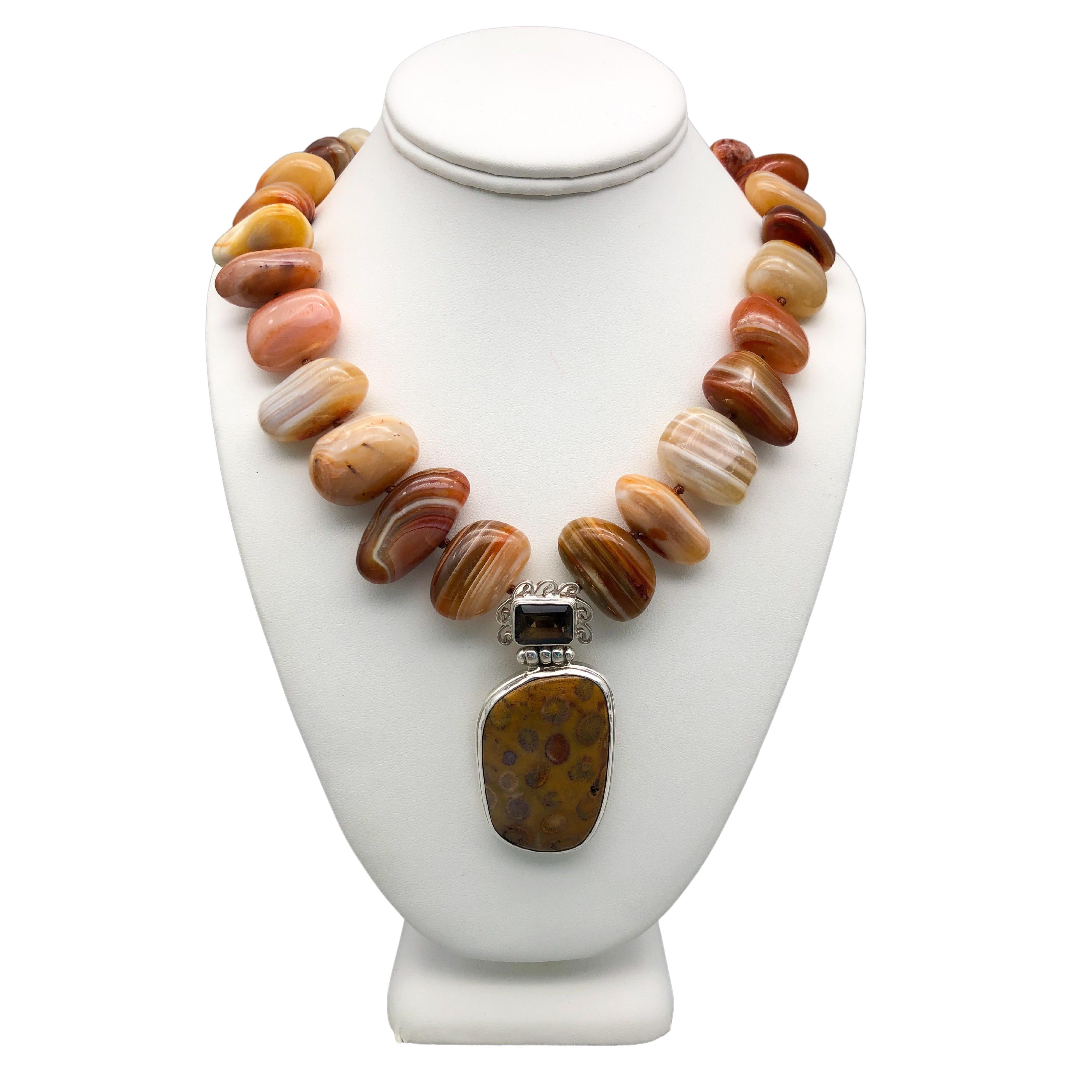 A.Jeschel Honey-colored striped Brazilian Agate pendant necklace. For Sale