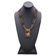 A.Jeschel Fine hand-painted Art Deco enamel pendant and Peacock Pearl necklace.