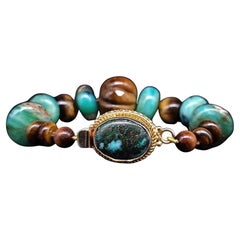 A.Jeschel Peruvian Opal and Tiger’s eye bracelet.