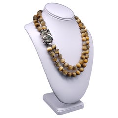 A.Jeschel Honey Tiger’s eye necklace combined with Pyrite clasp.