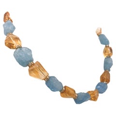 A.Jeschel Brilliant blue hammered aquamarine  and faceted citrine