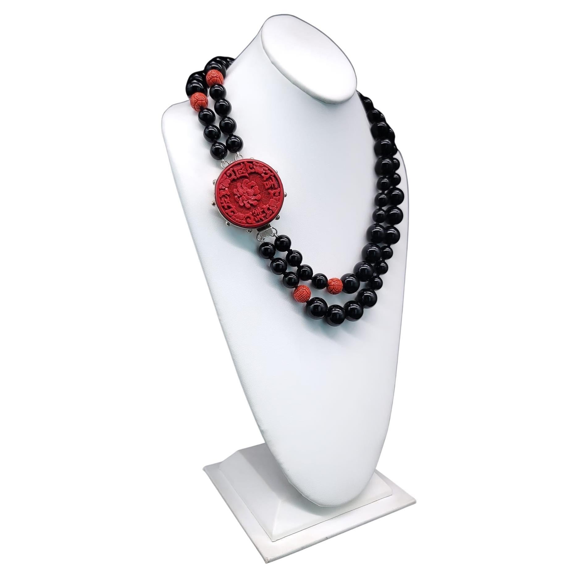 A.Jeschel Stunning Onyx necklace with carved Cinnabar clasp.