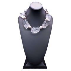 A.Jeschel Collier massif en cristal de roche martelé riche et massif